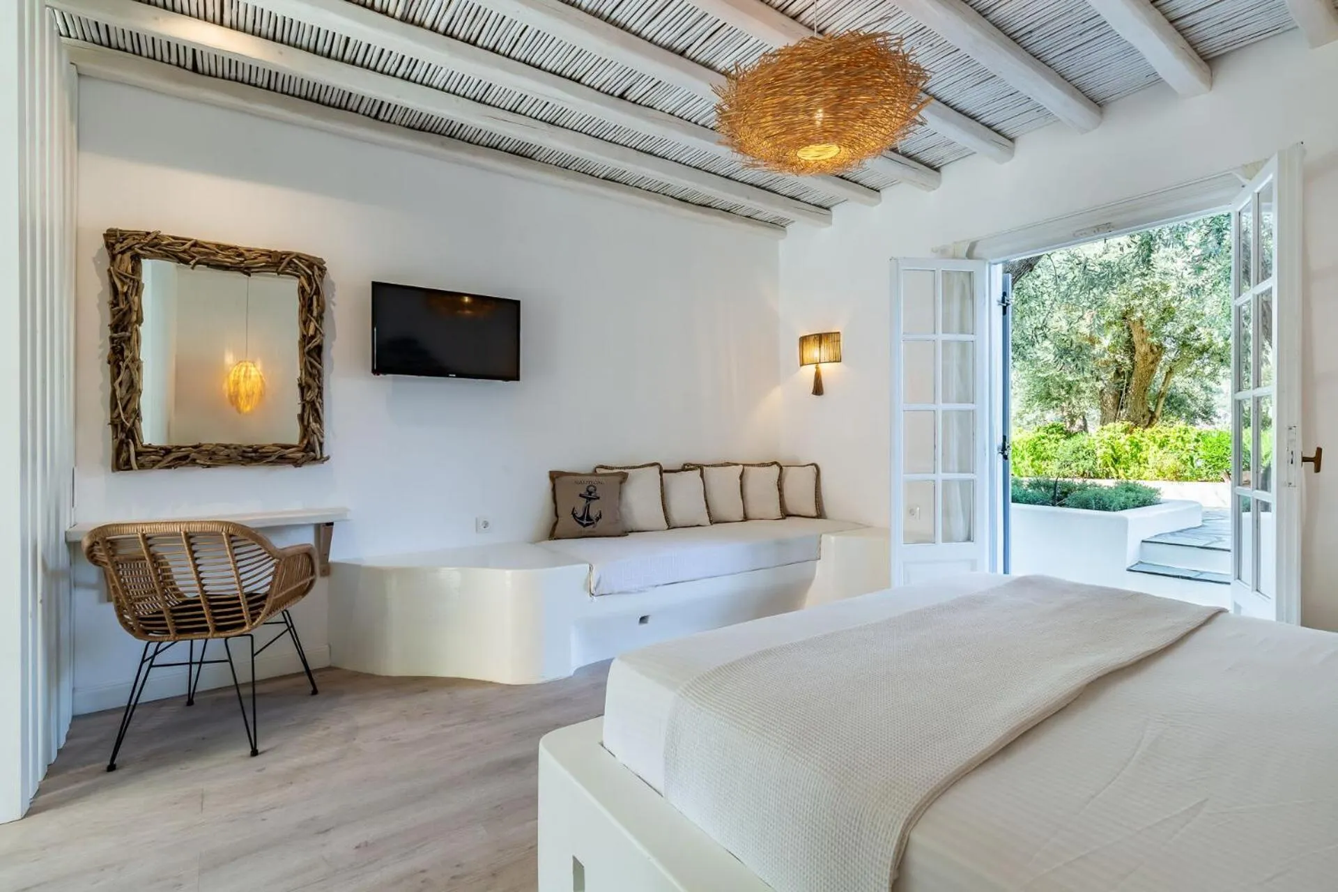 Bed in Evlalia Studios & Villas