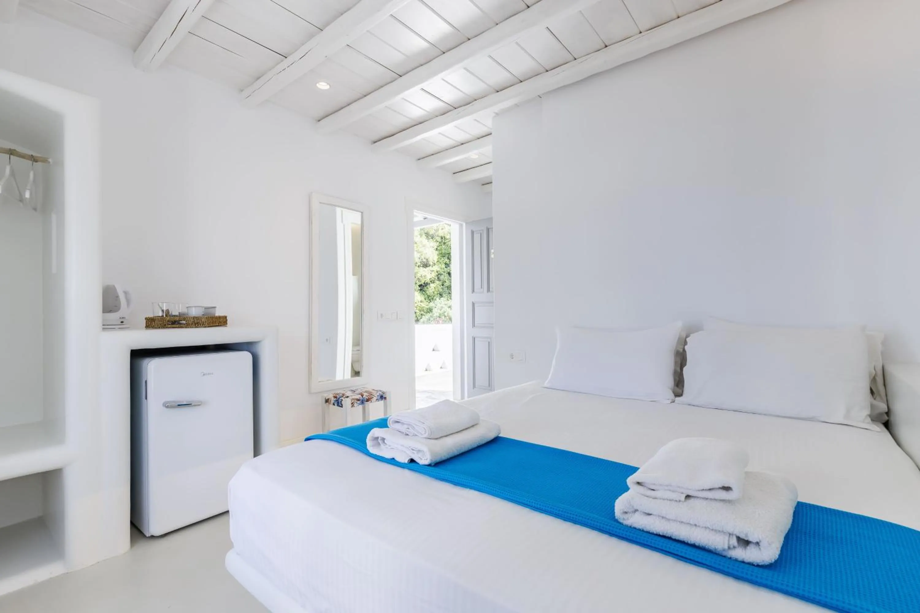 Bed in Evlalia Studios & Villas