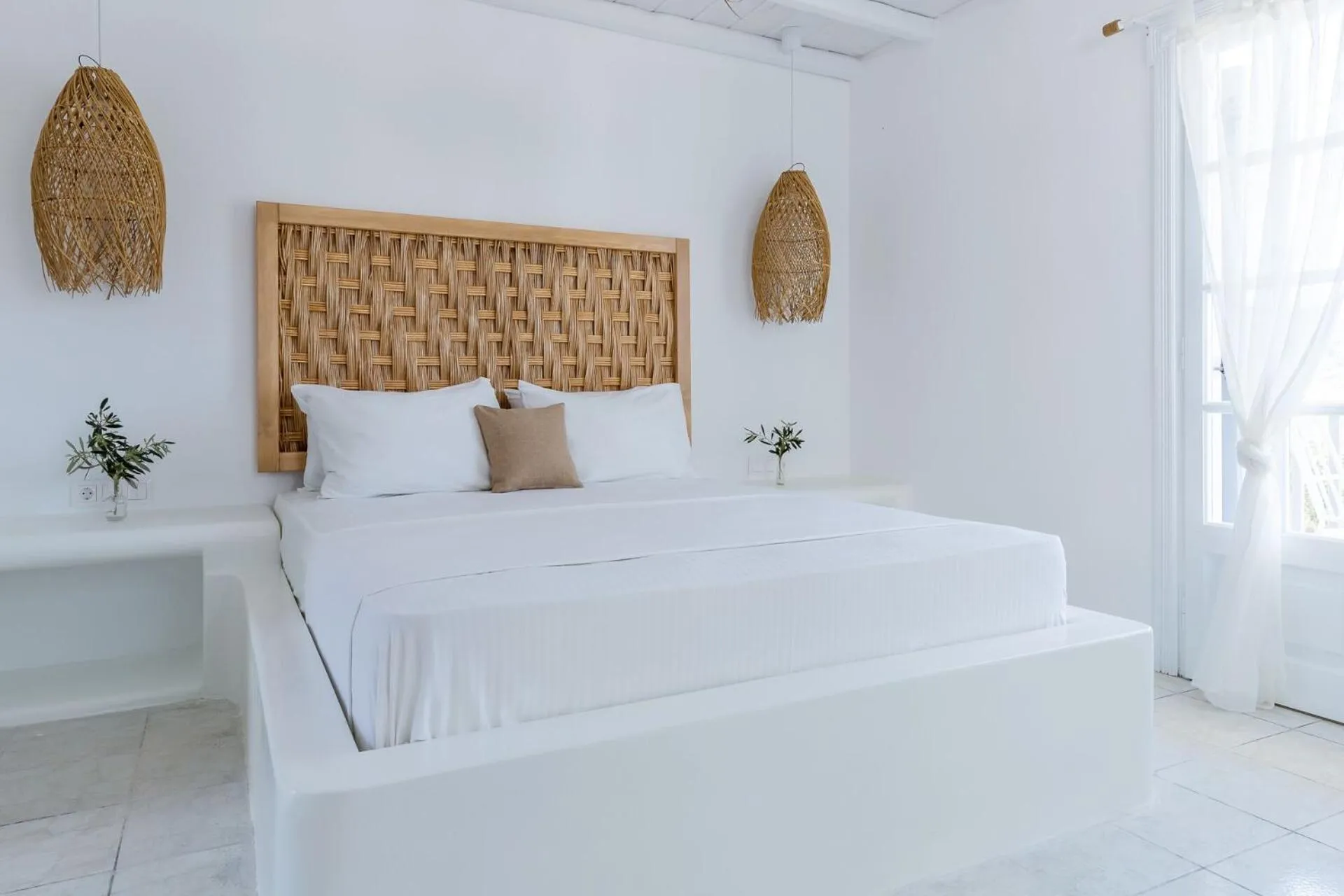 Bed in Evlalia Studios & Villas