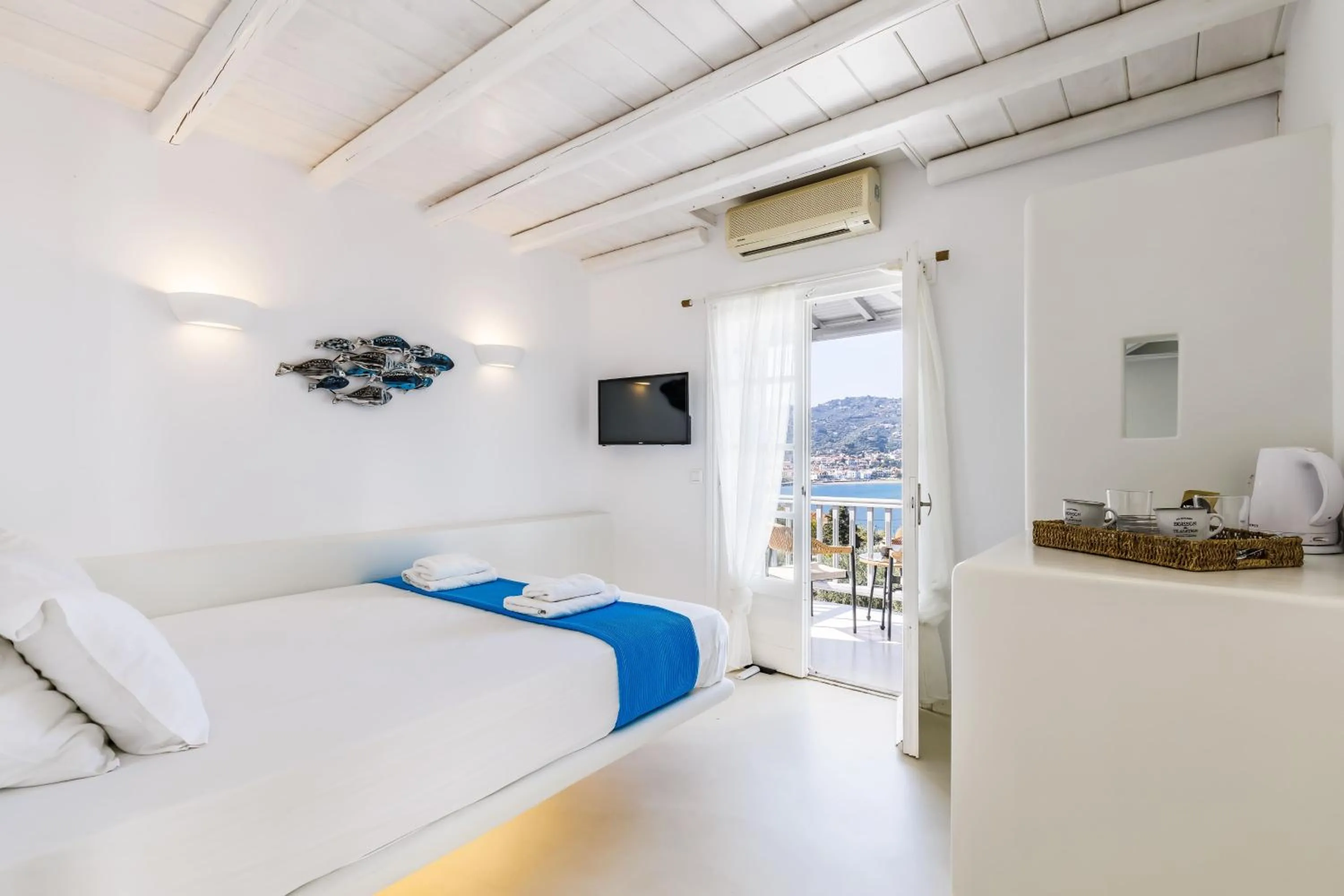 Bed in Evlalia Studios & Villas