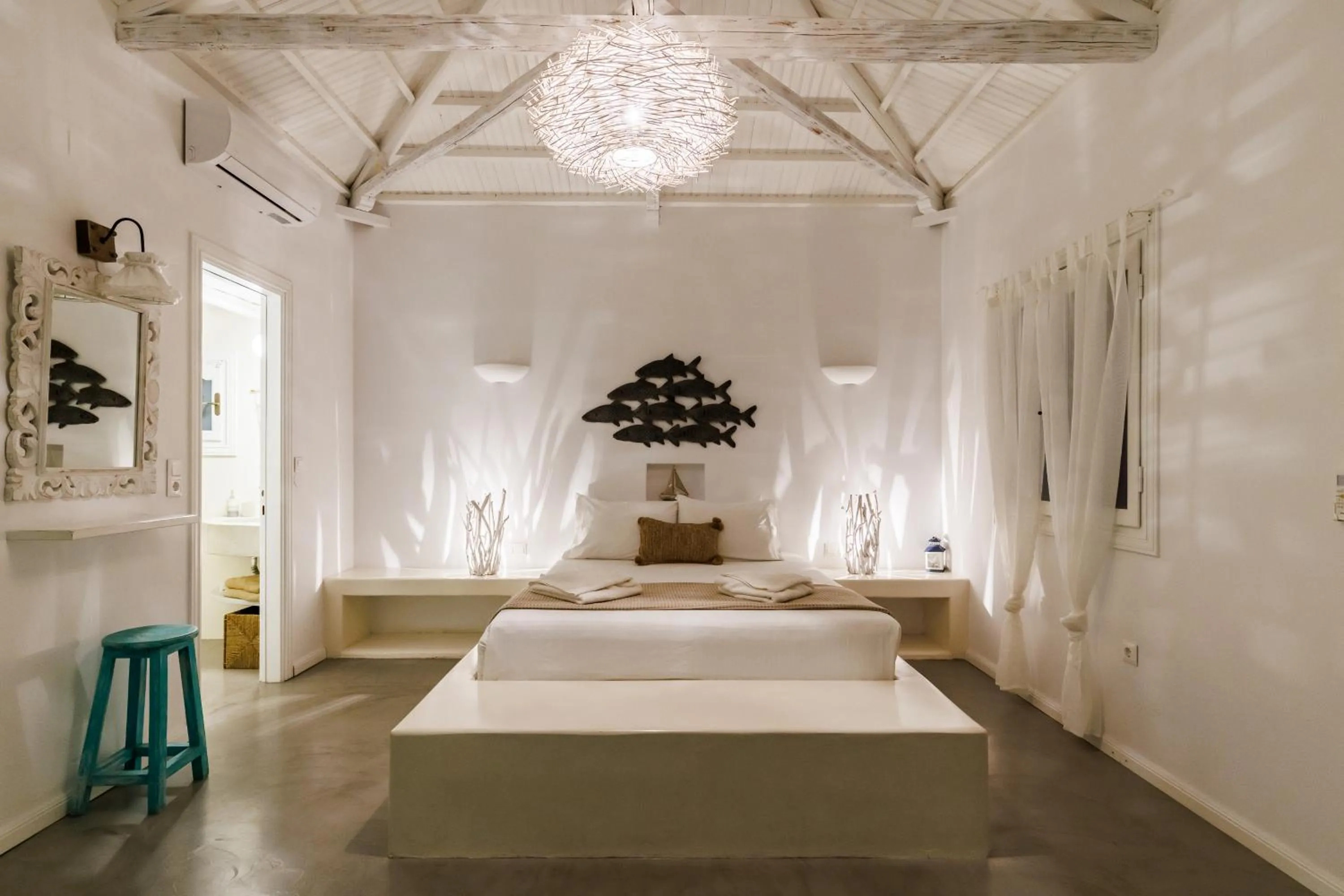 Bed in Evlalia Studios & Villas