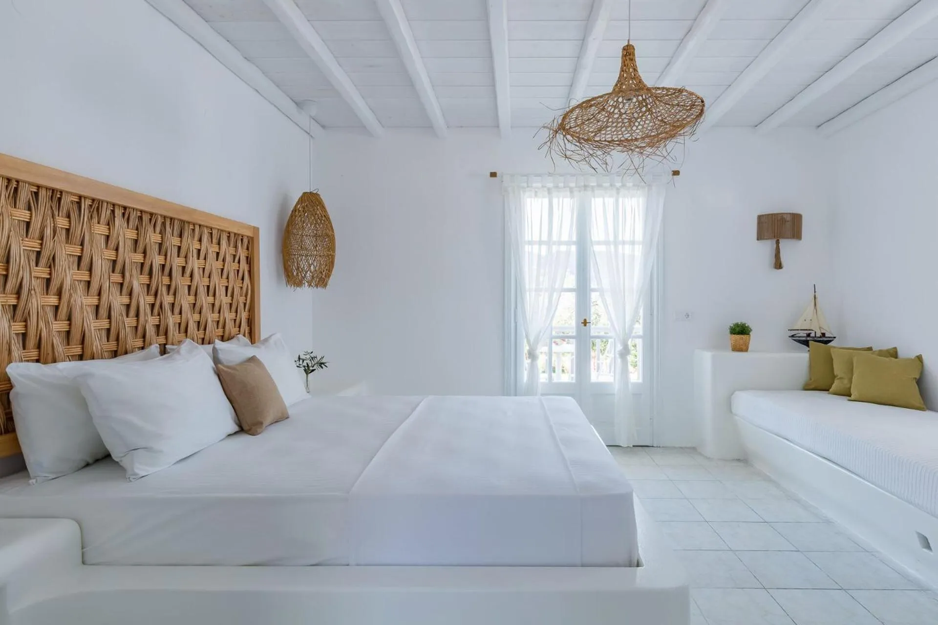 Bed in Evlalia Studios & Villas