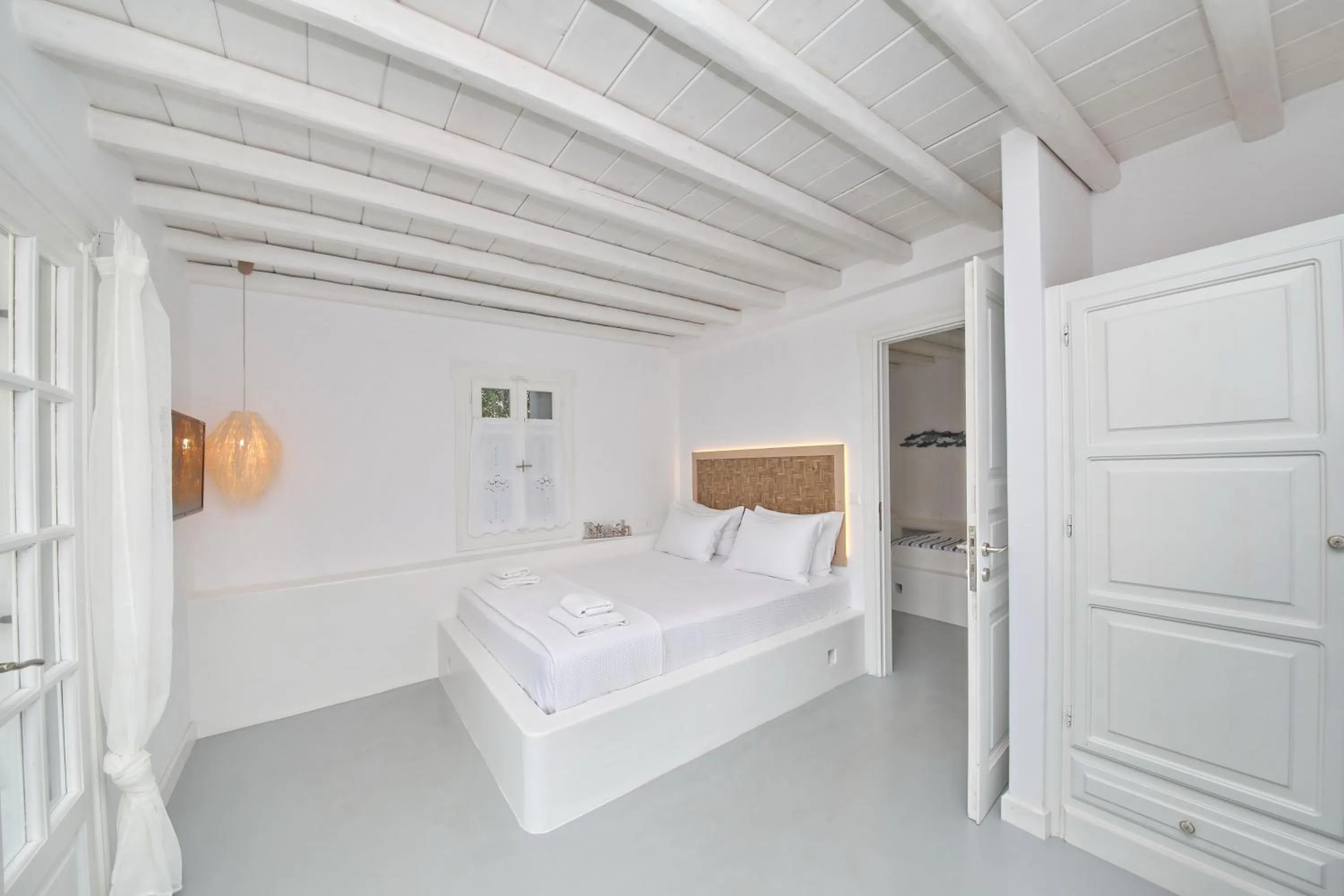 Bed in Evlalia Studios & Villas