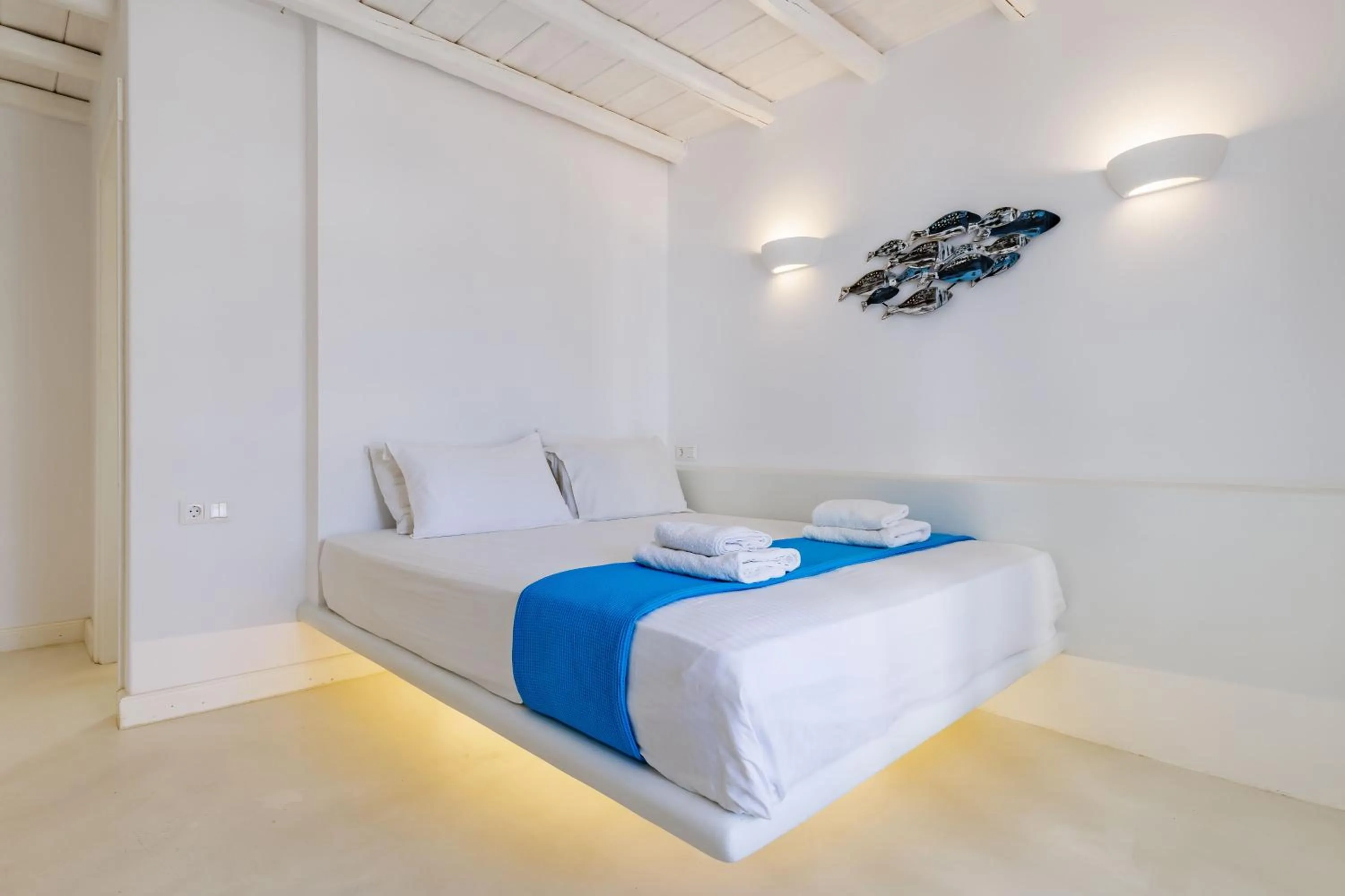 Bed in Evlalia Studios & Villas