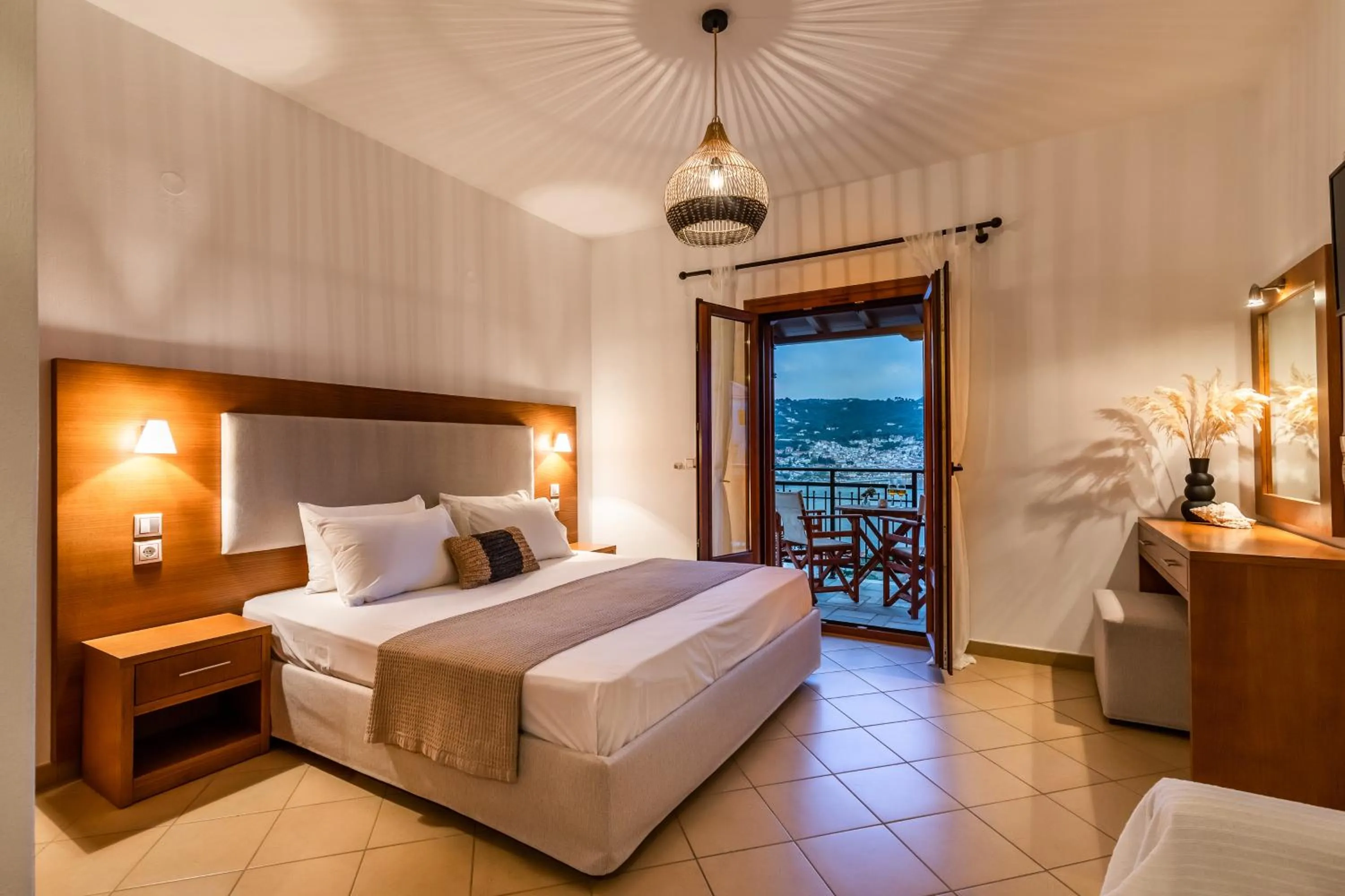 Bed in Evlalia Studios & Villas