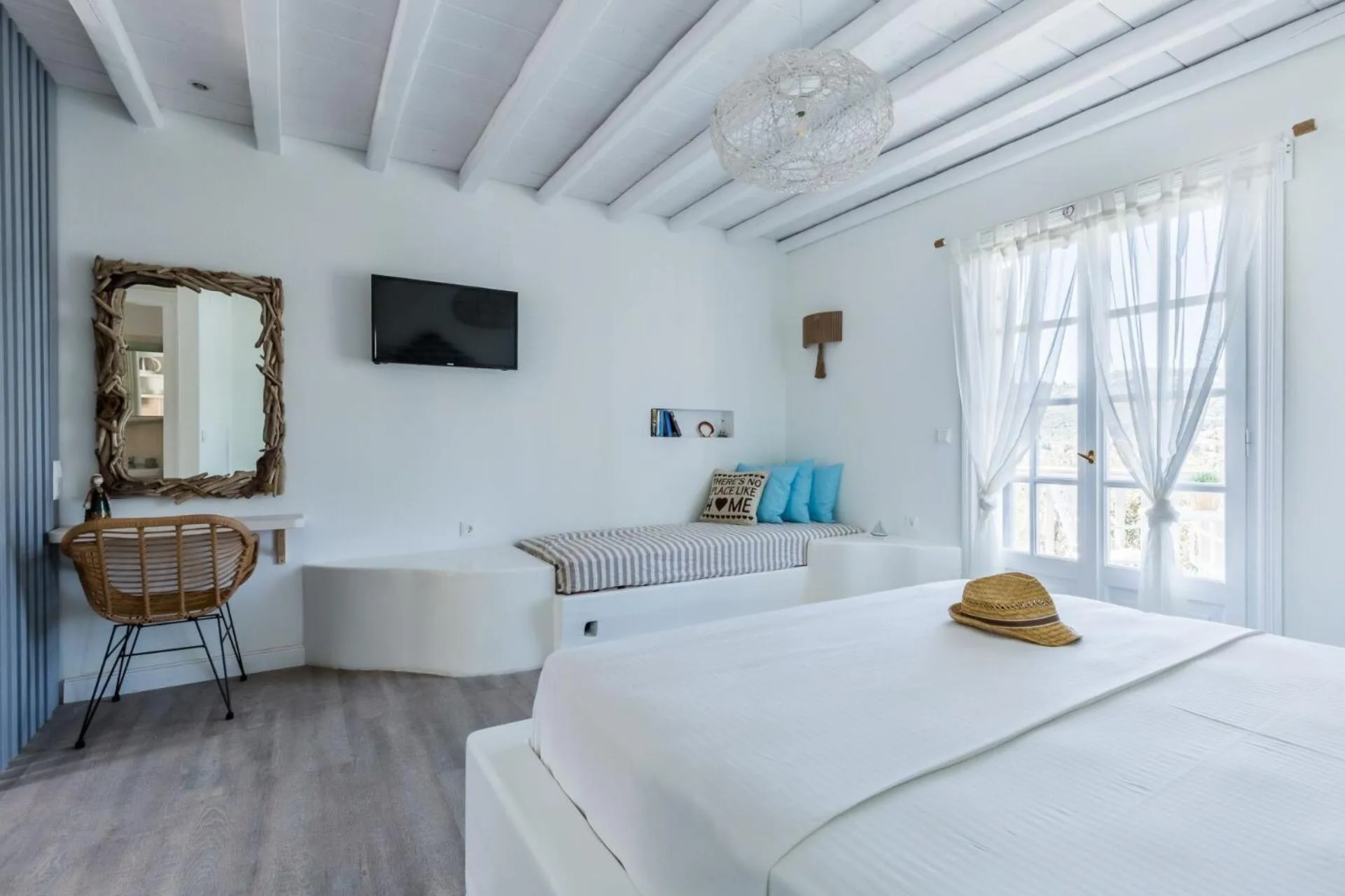 Bed in Evlalia Studios & Villas