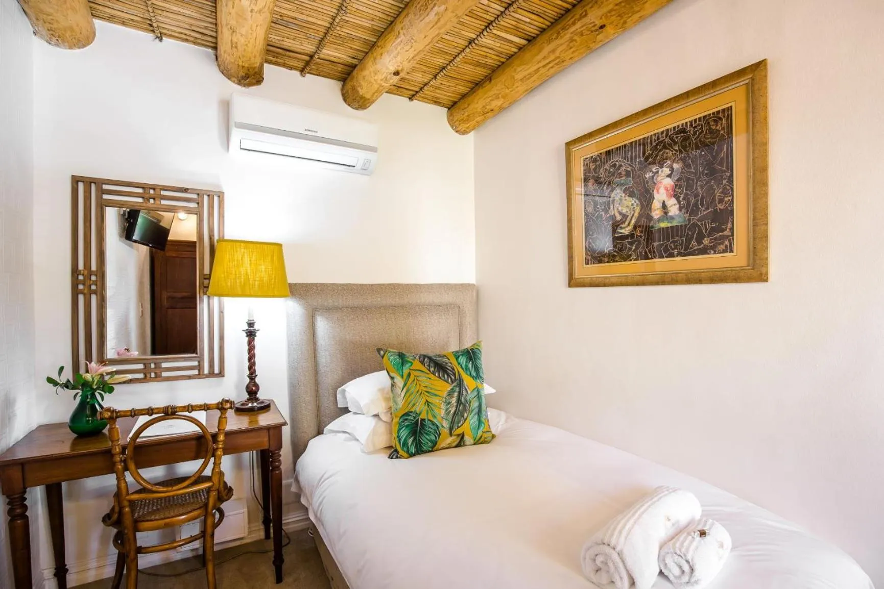 Bed in Roosenwijn Guesthouse