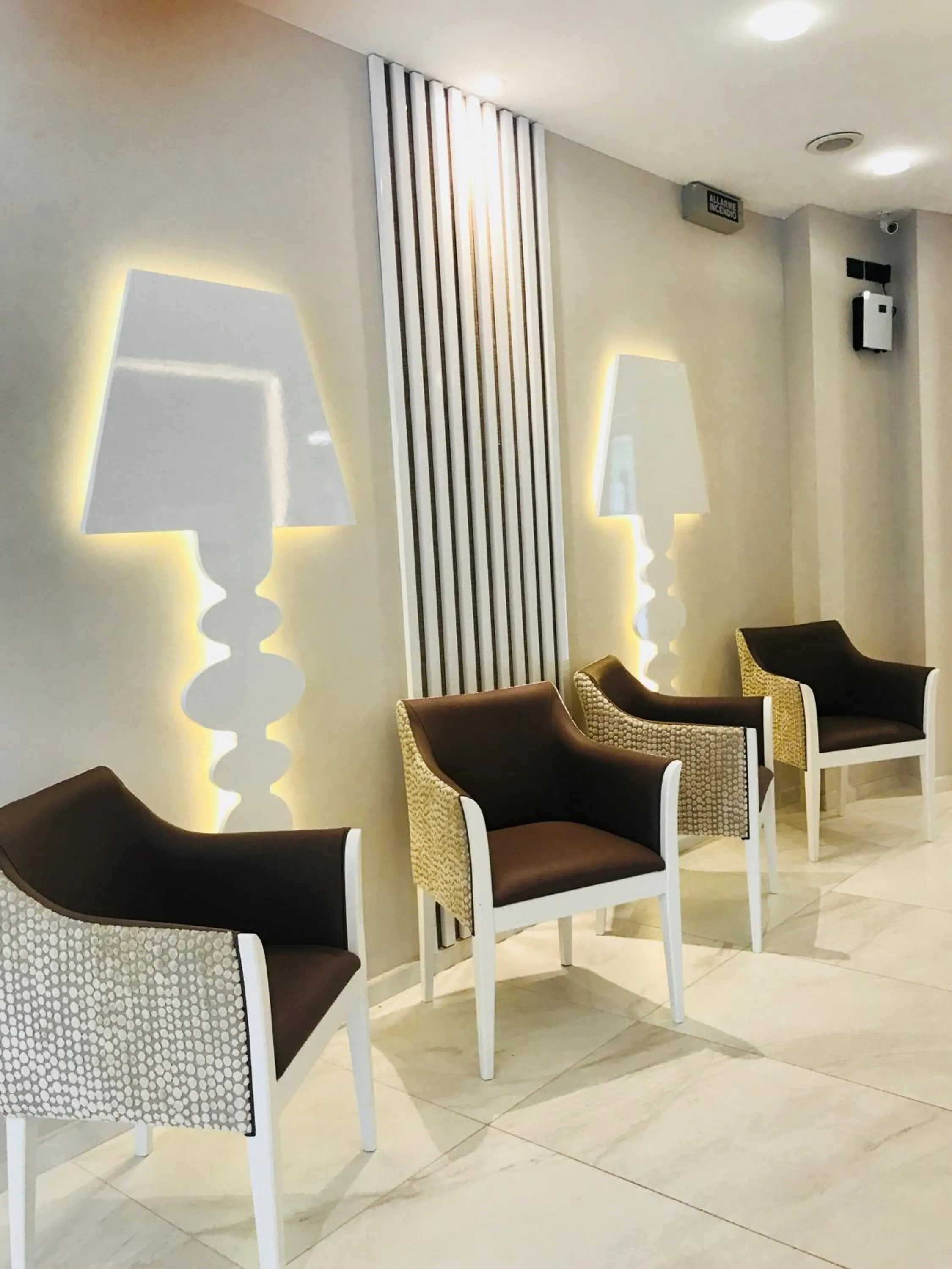 Communal lounge/ TV room in Hotel Villa Paola