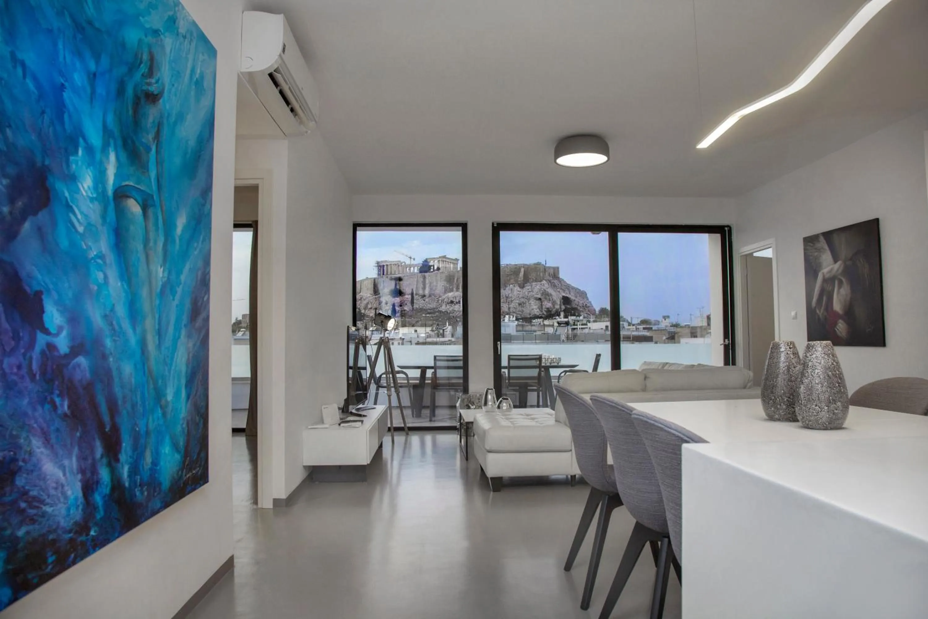 Living room in Luxury Penthouse touching the Acropolis by GHH