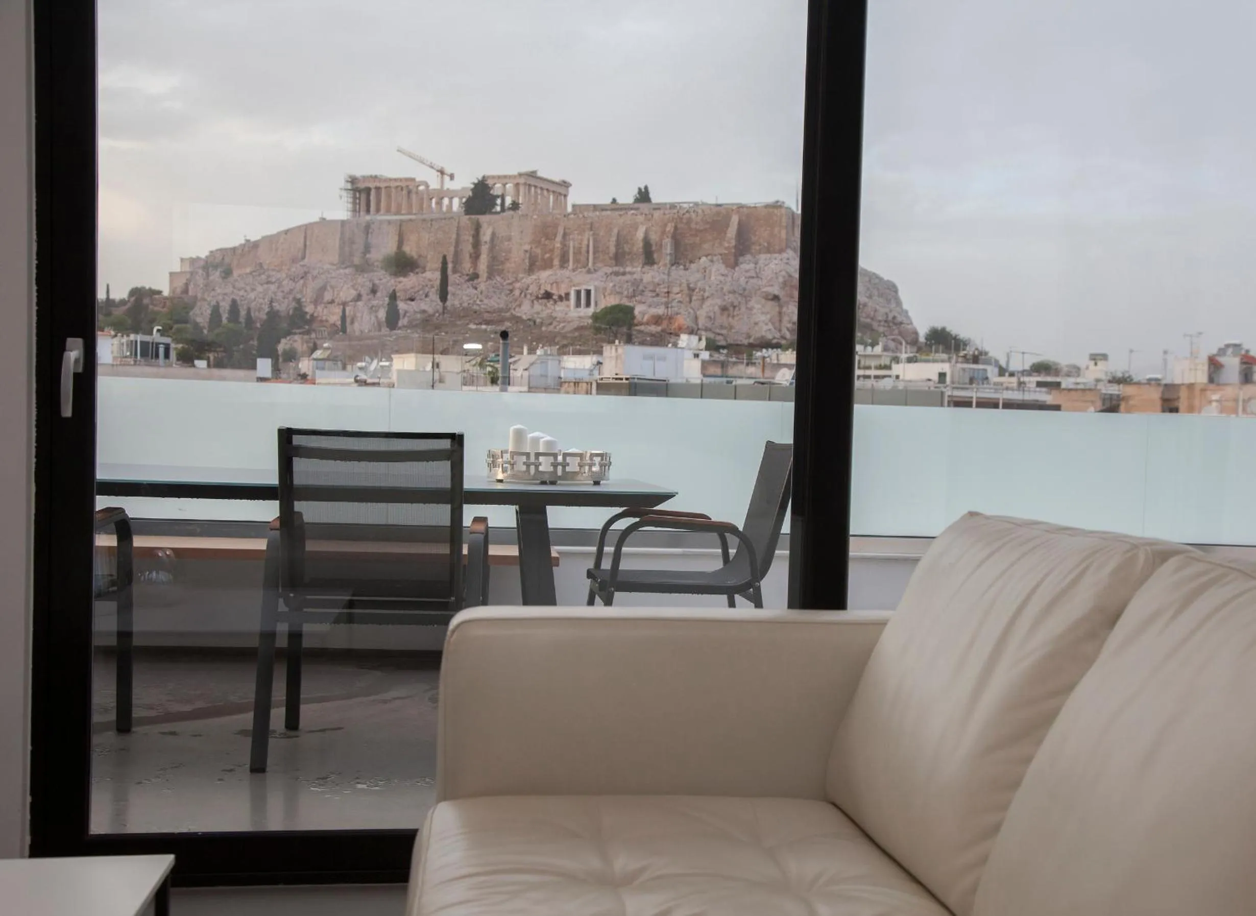 Living room in Luxury Penthouse touching the Acropolis by GHH