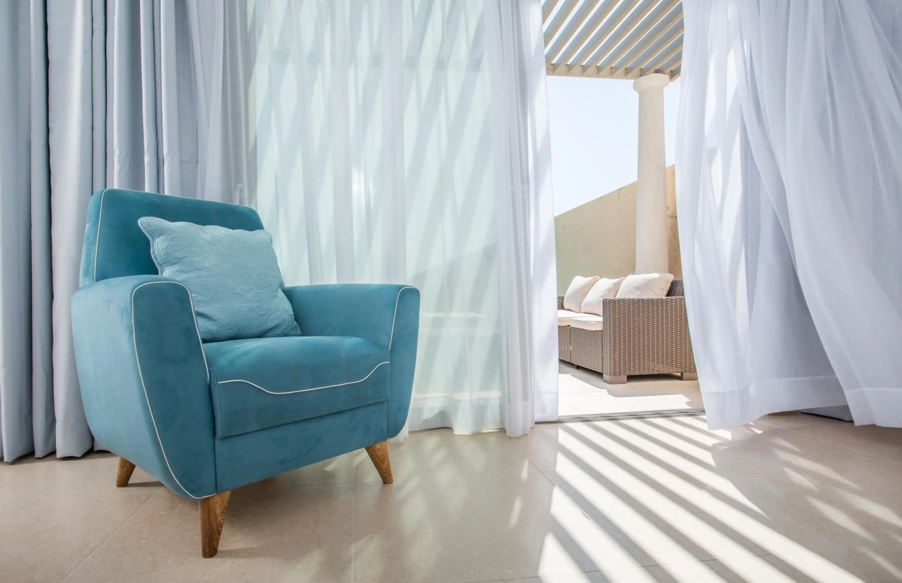 Seating area, Bed in White Rock of Kos Hotel - Adults only