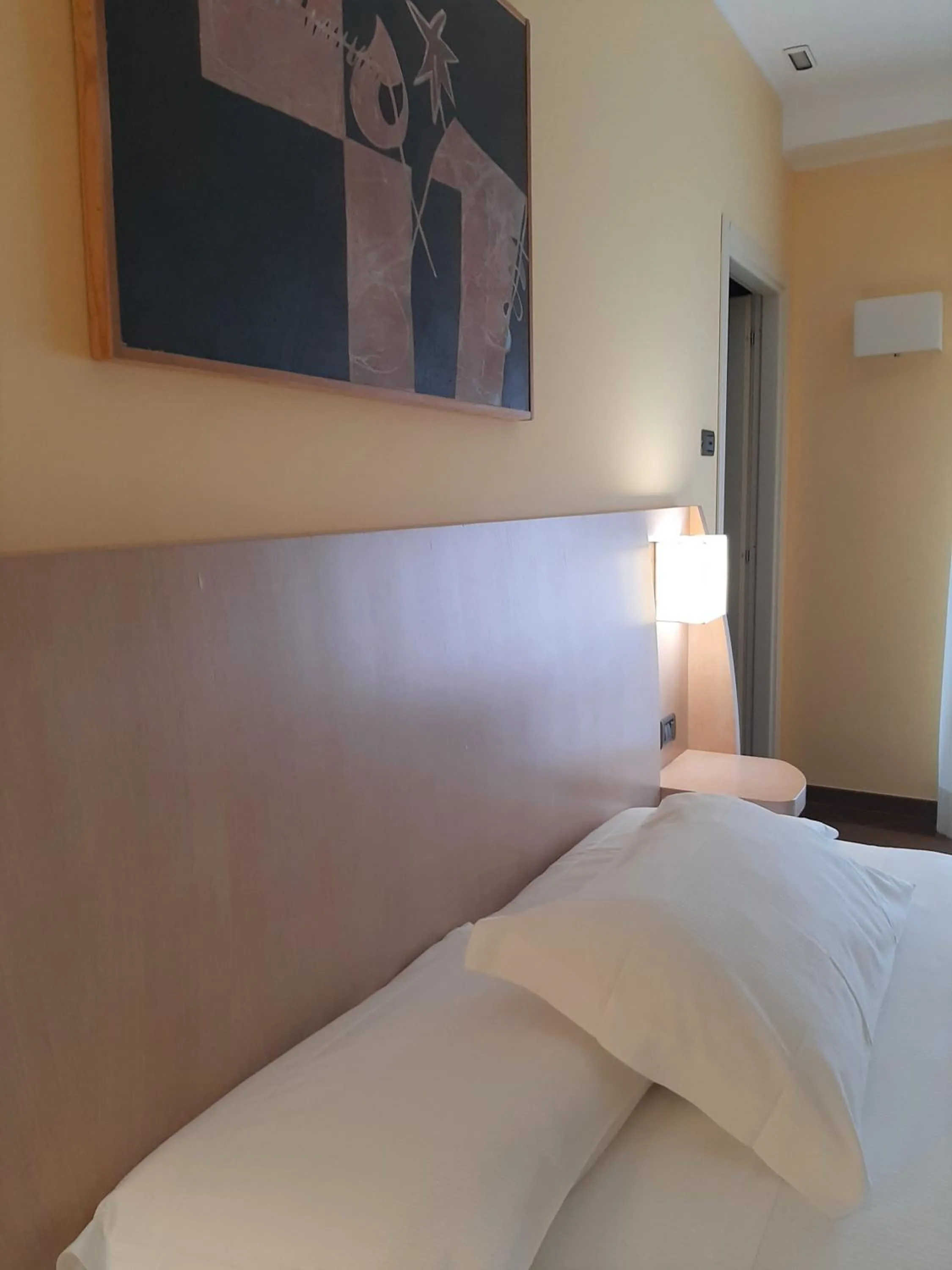 Bed in Hotel Chiaraluna