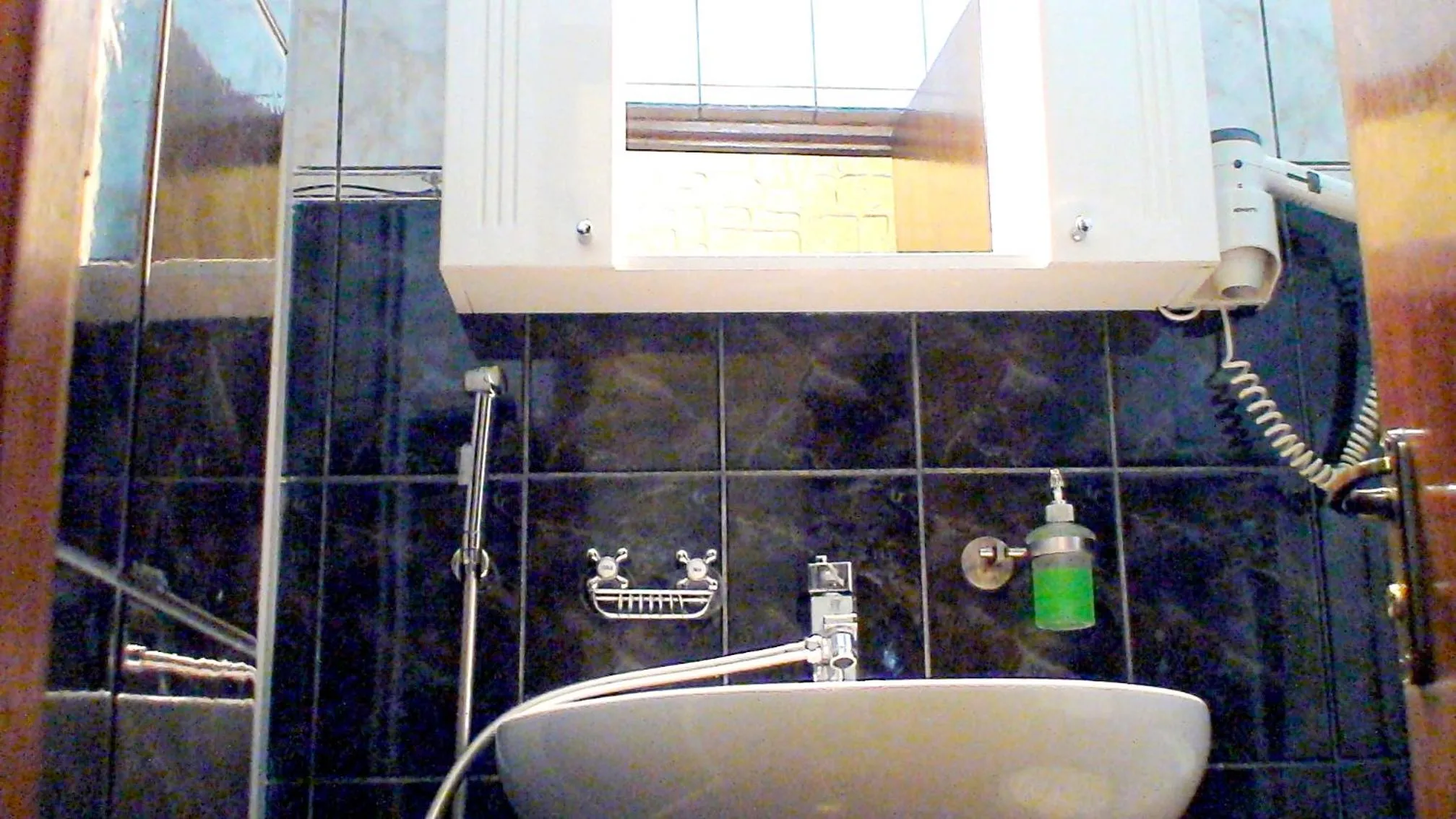 Bathroom in RomPromo Plus Accommodation