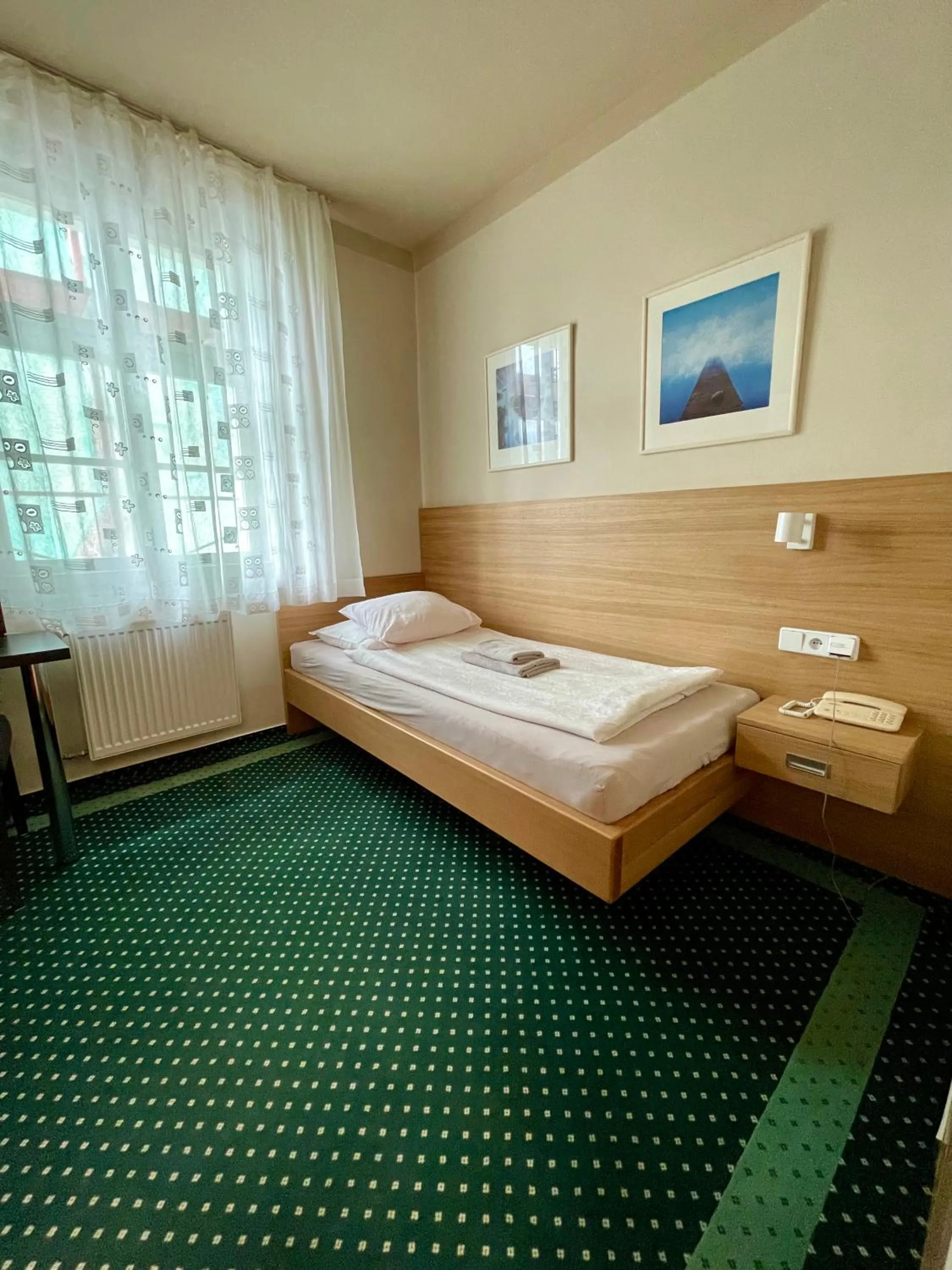 Bed in Hotel Vacek Pod Věží