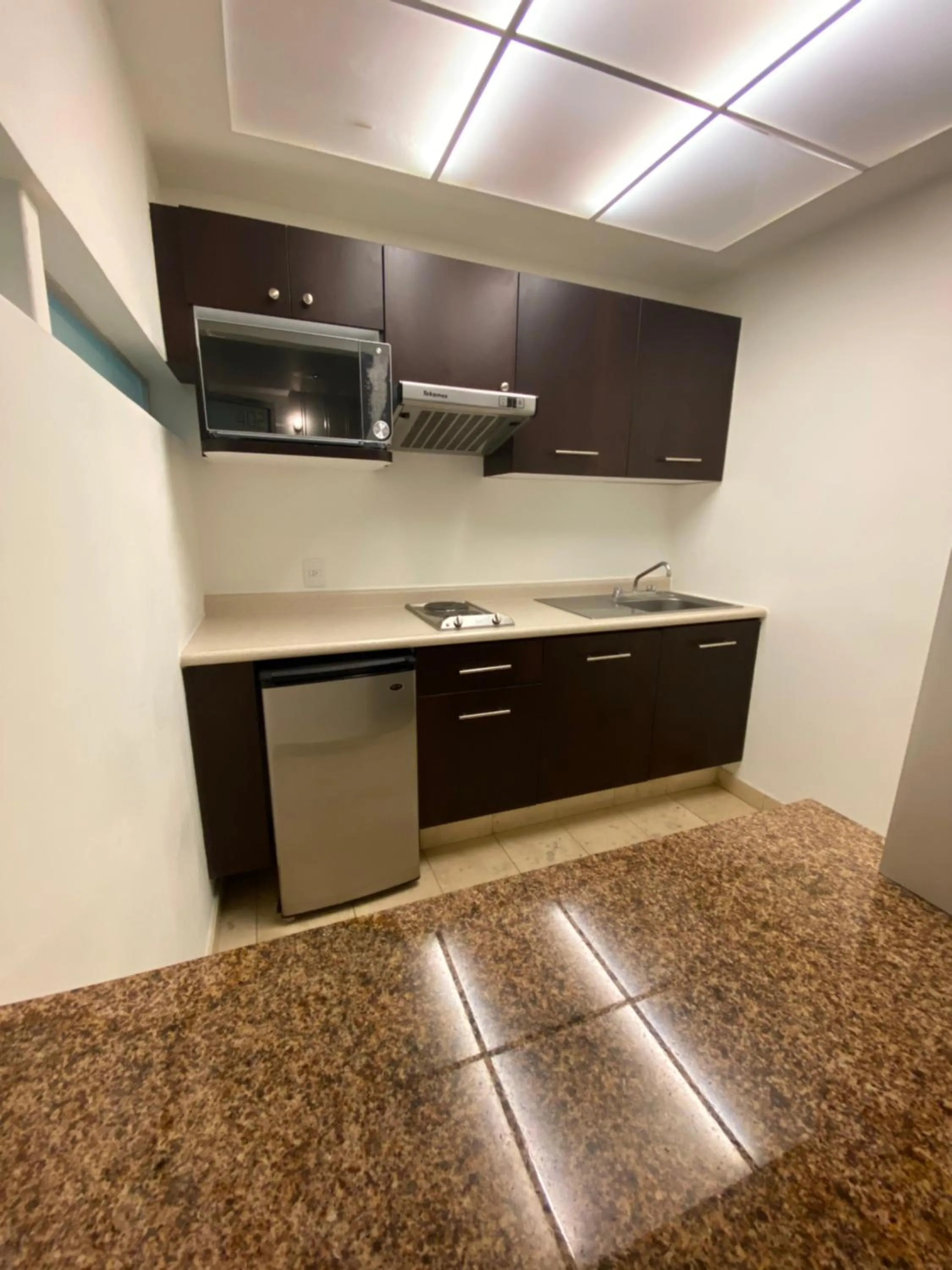 Kitchen or kitchenette in Suites Teca Once