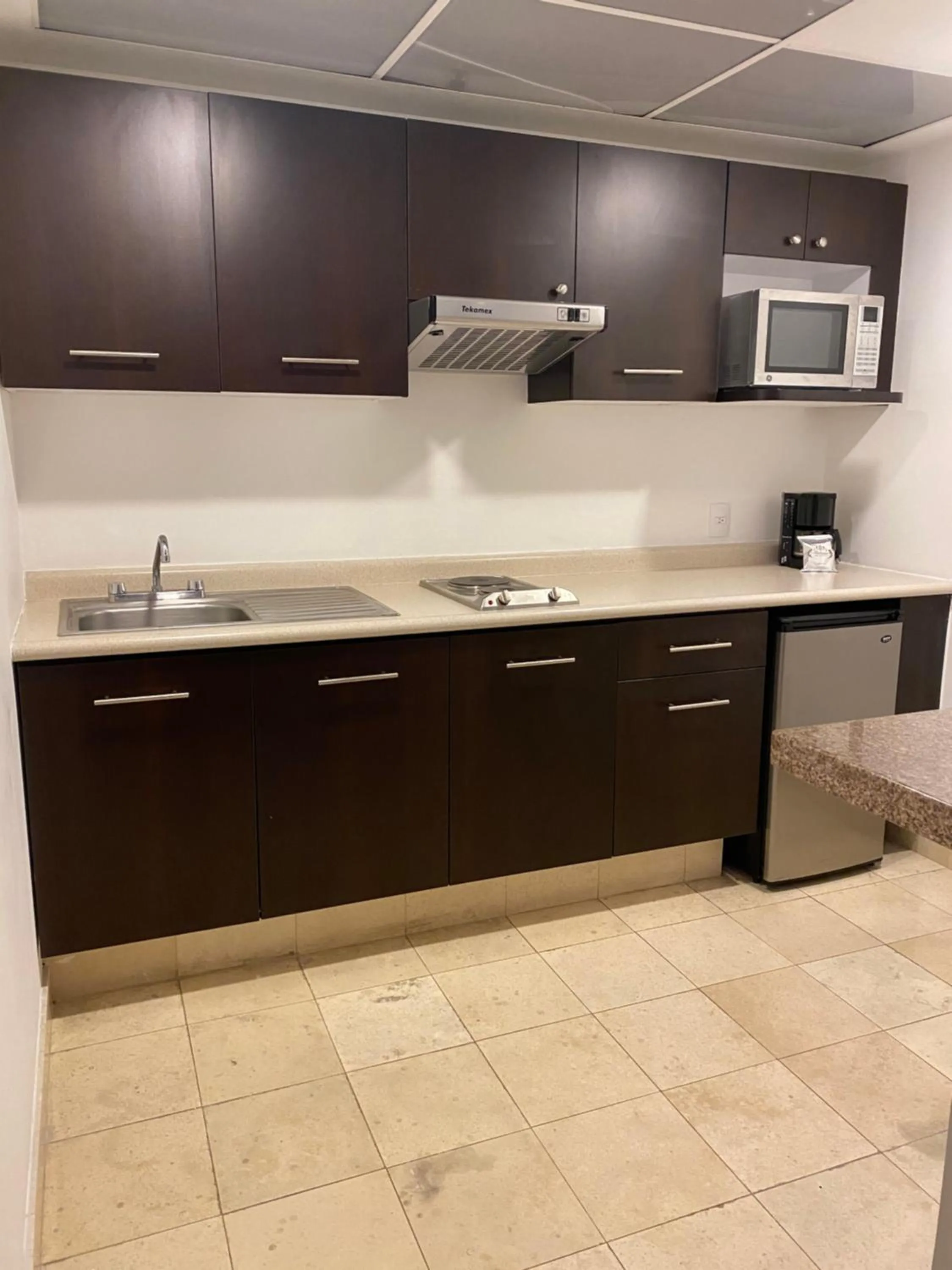 Kitchen or kitchenette in Suites Teca Once