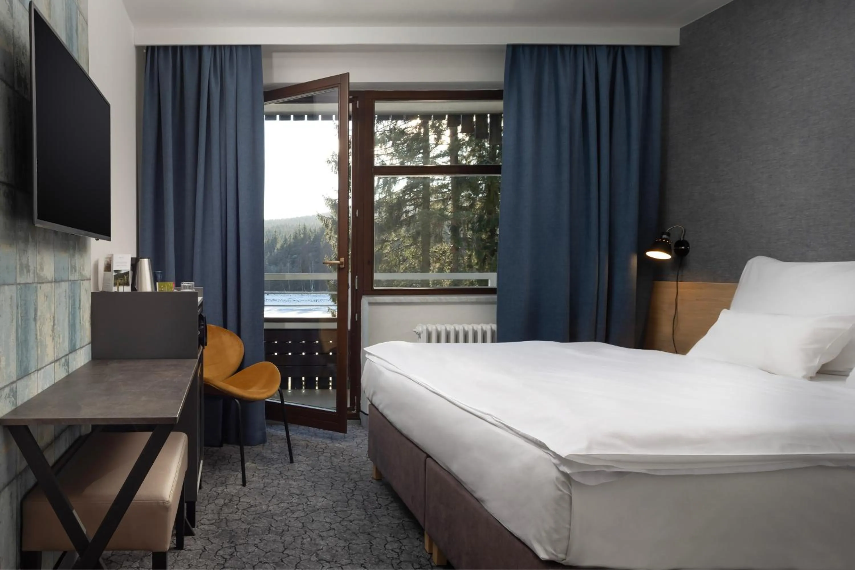 Photo of the whole room, Bed in OREA Resort Devět Skal Vysočina