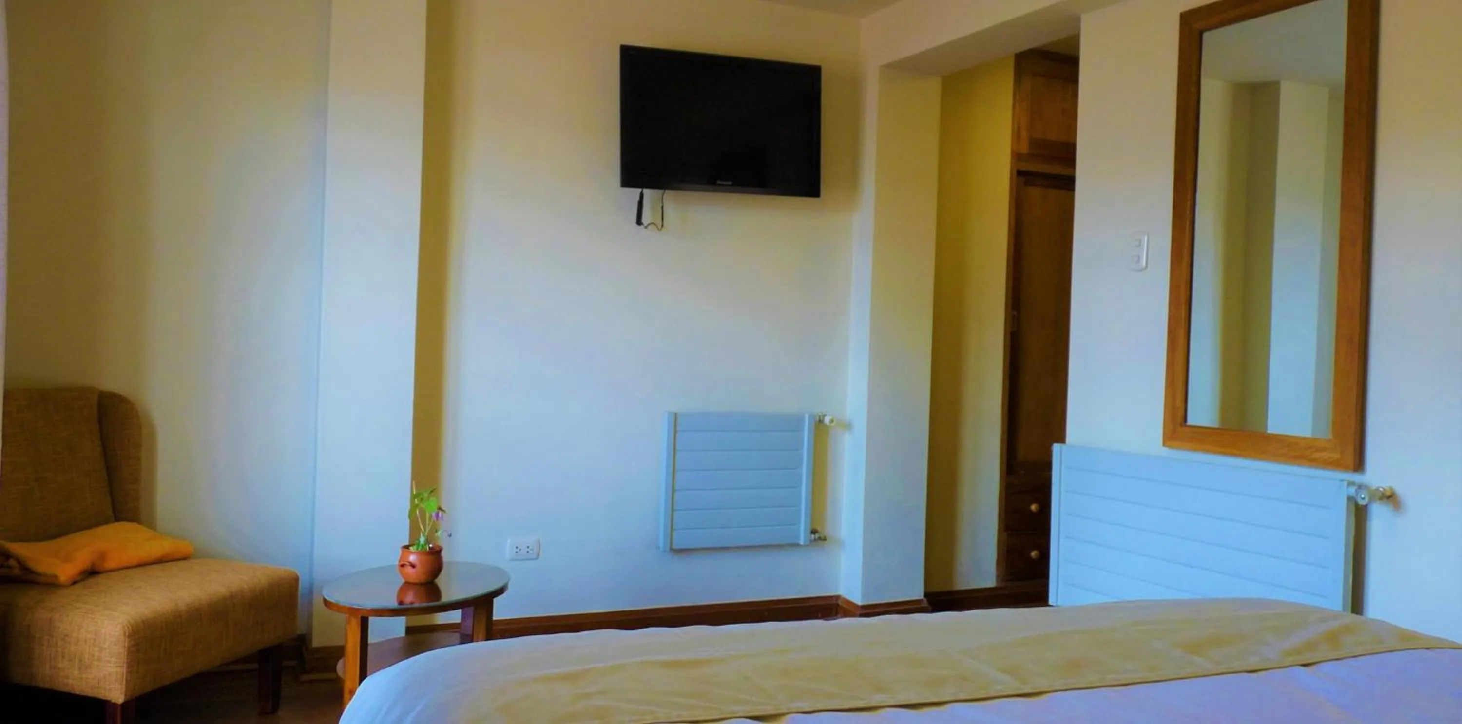 Bedroom in Eco-Hotel Pension Alemana