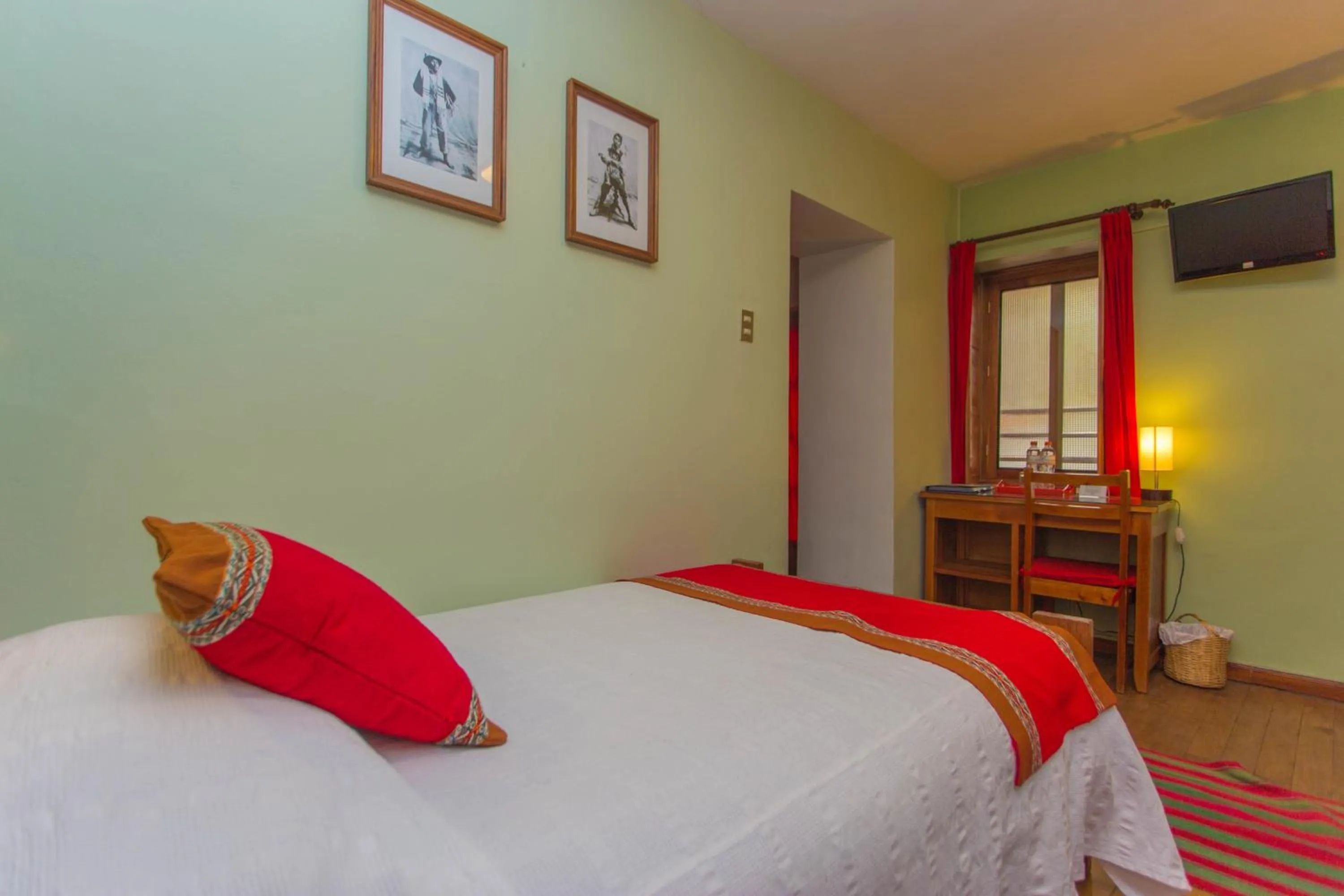 Bed in Eco-Hotel Pension Alemana