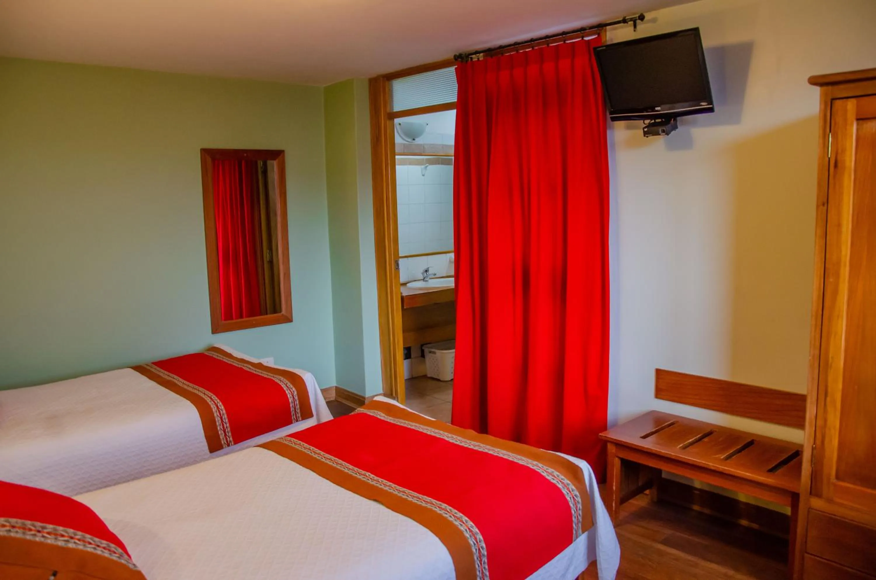 Bedroom in Eco-Hotel Pension Alemana