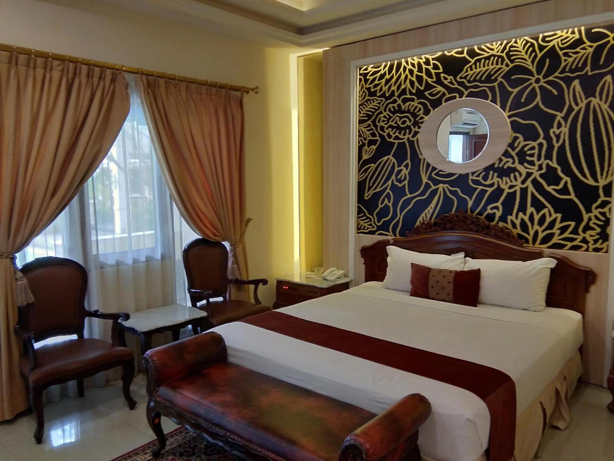 Bed in Hotel Indah Palace Yogyakarta