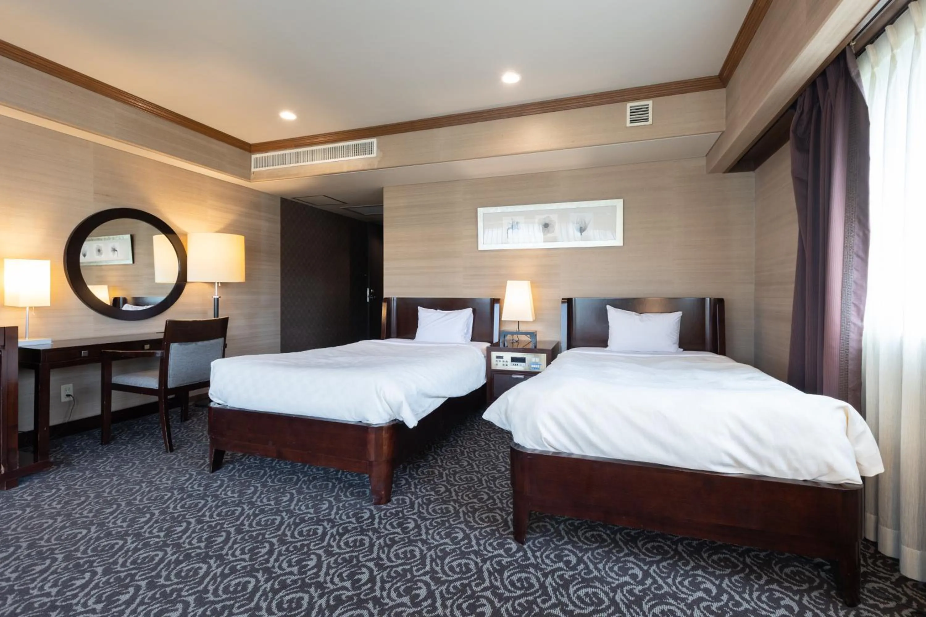 Bed in Atami Season Hotel