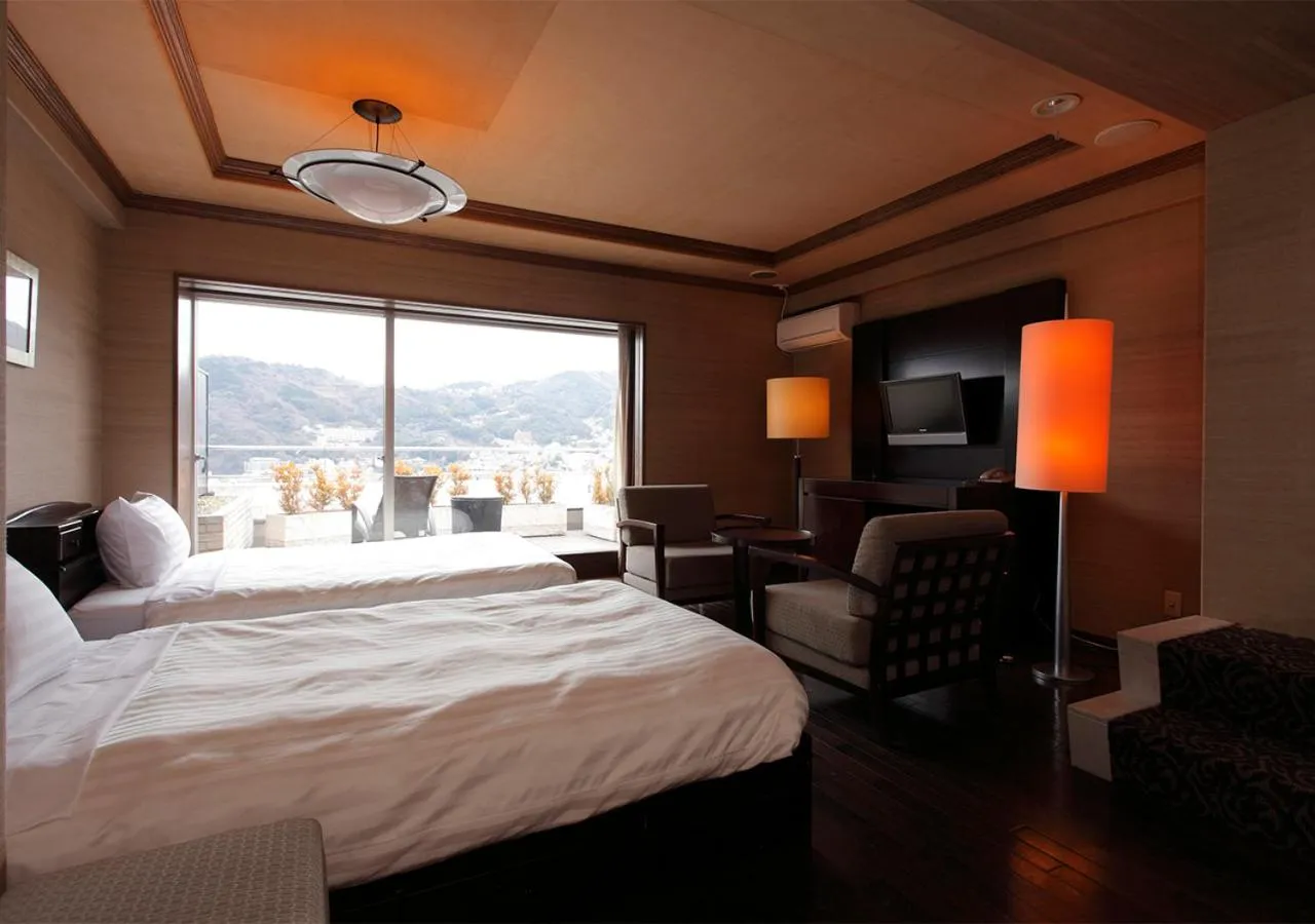 Bed in Atami Season Hotel