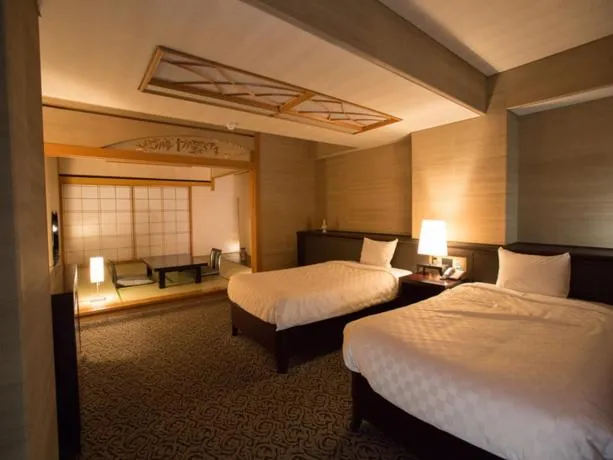 Bed in Atami Season Hotel