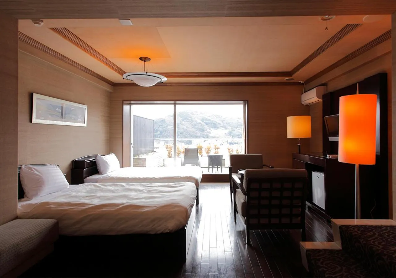 Bed in Atami Season Hotel