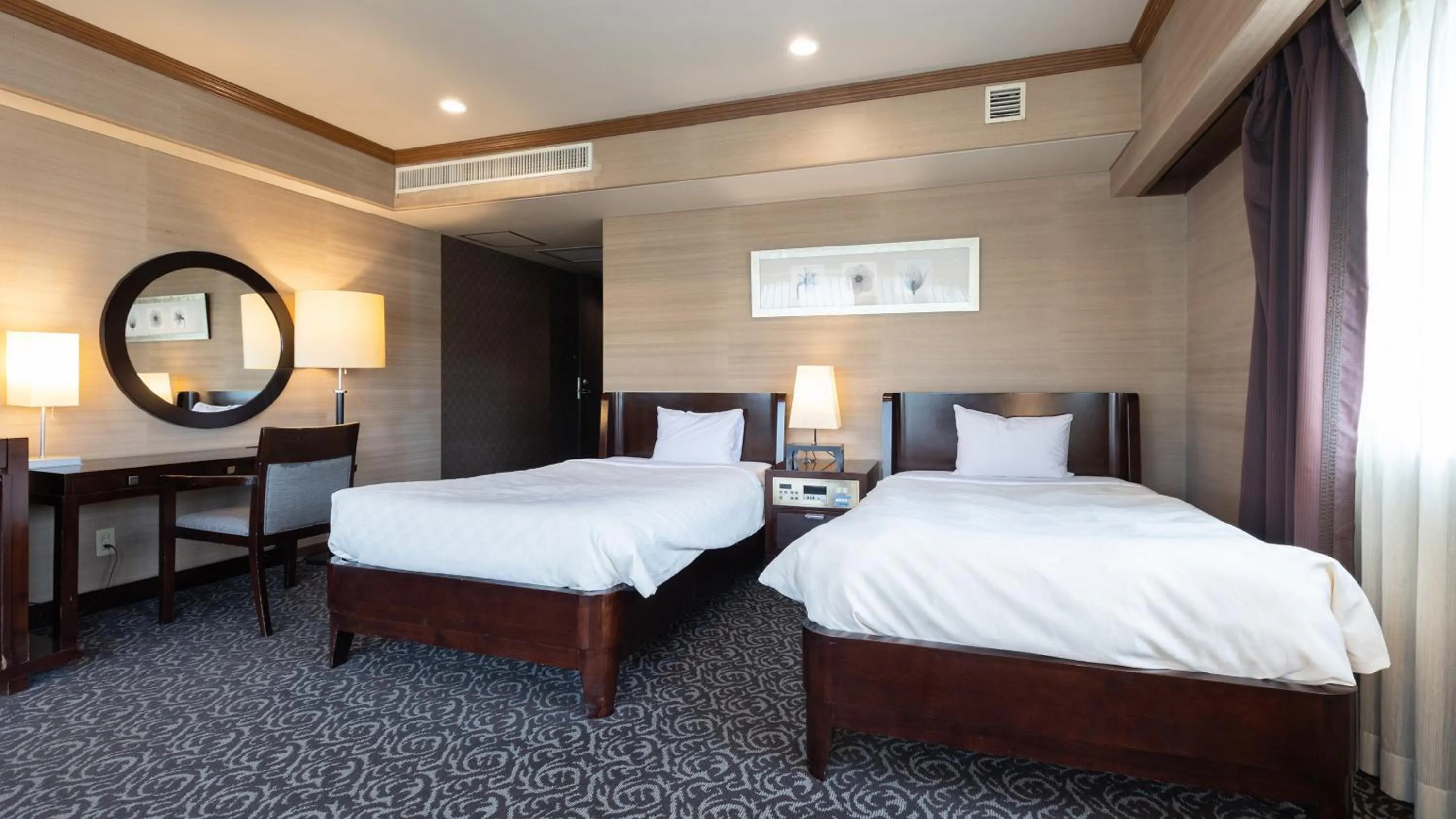 Bed in Atami Season Hotel