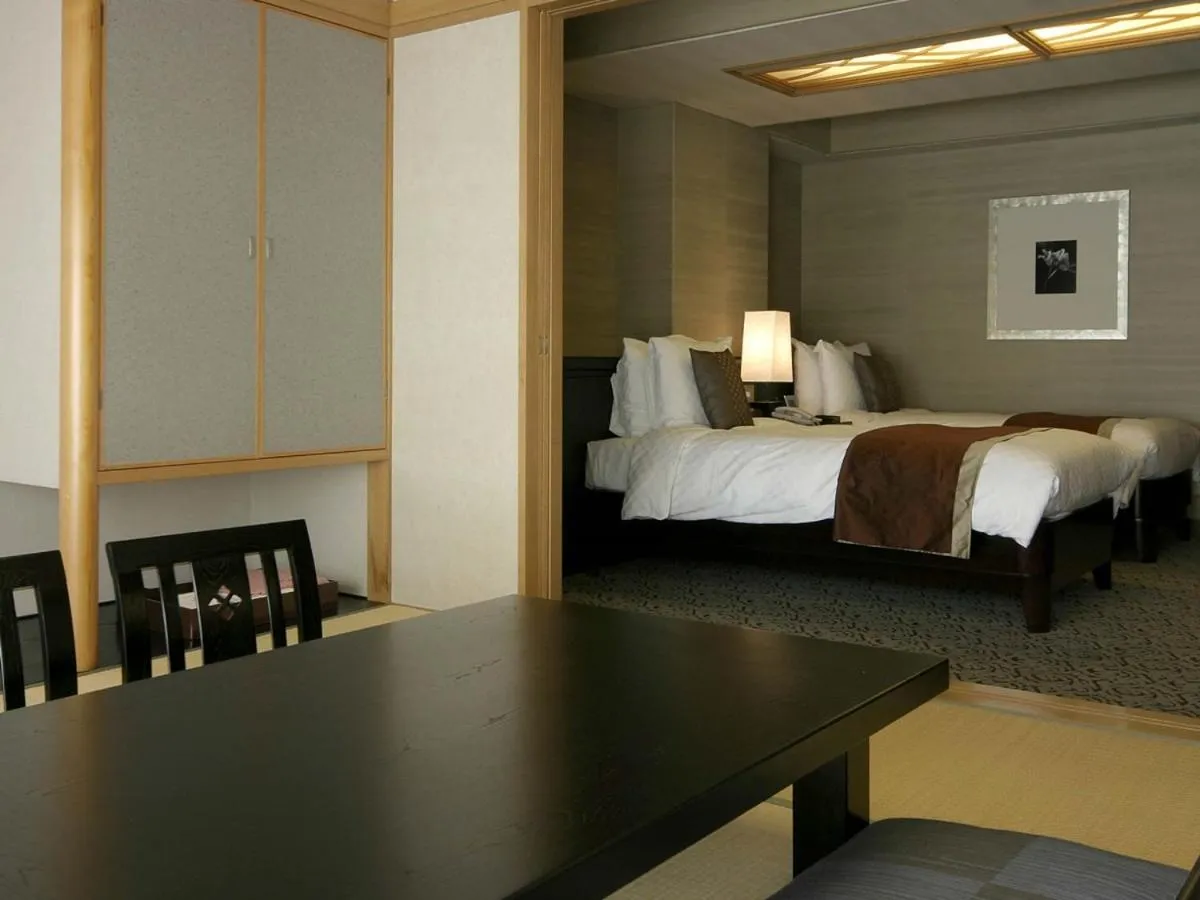 Bed in Atami Season Hotel