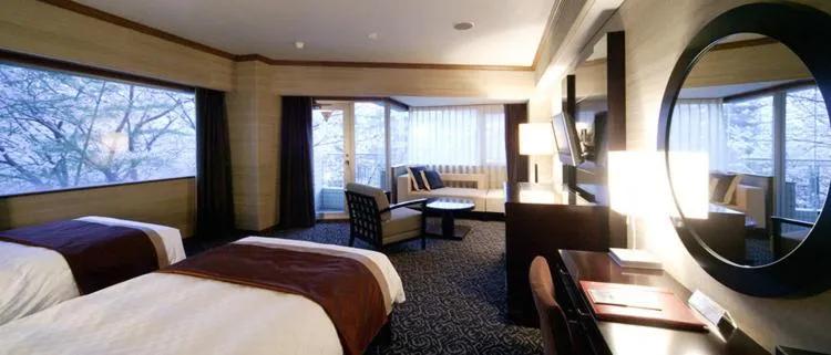 Bed in Atami Season Hotel