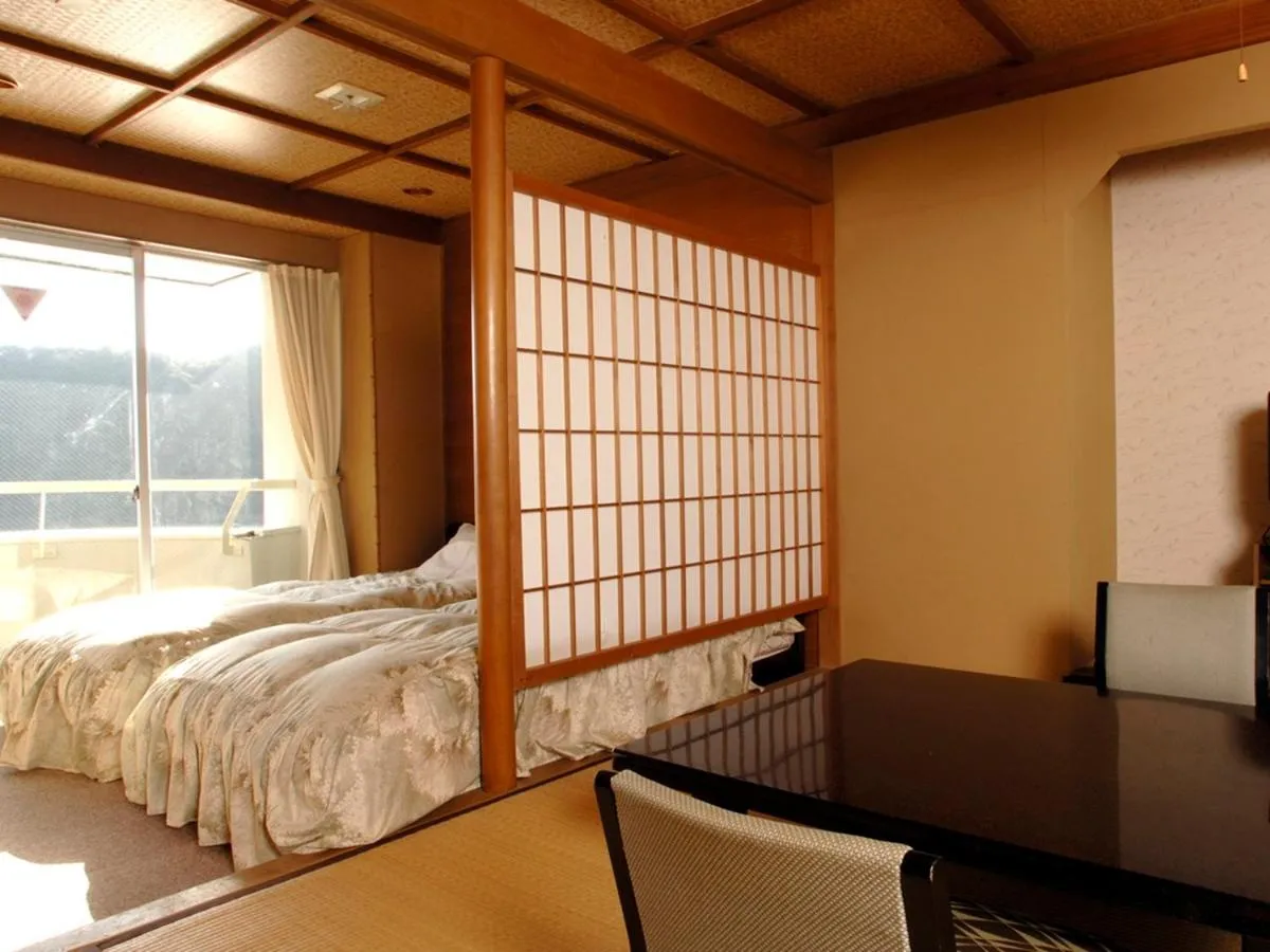 Bed in Shimoda Kaihin Hotel