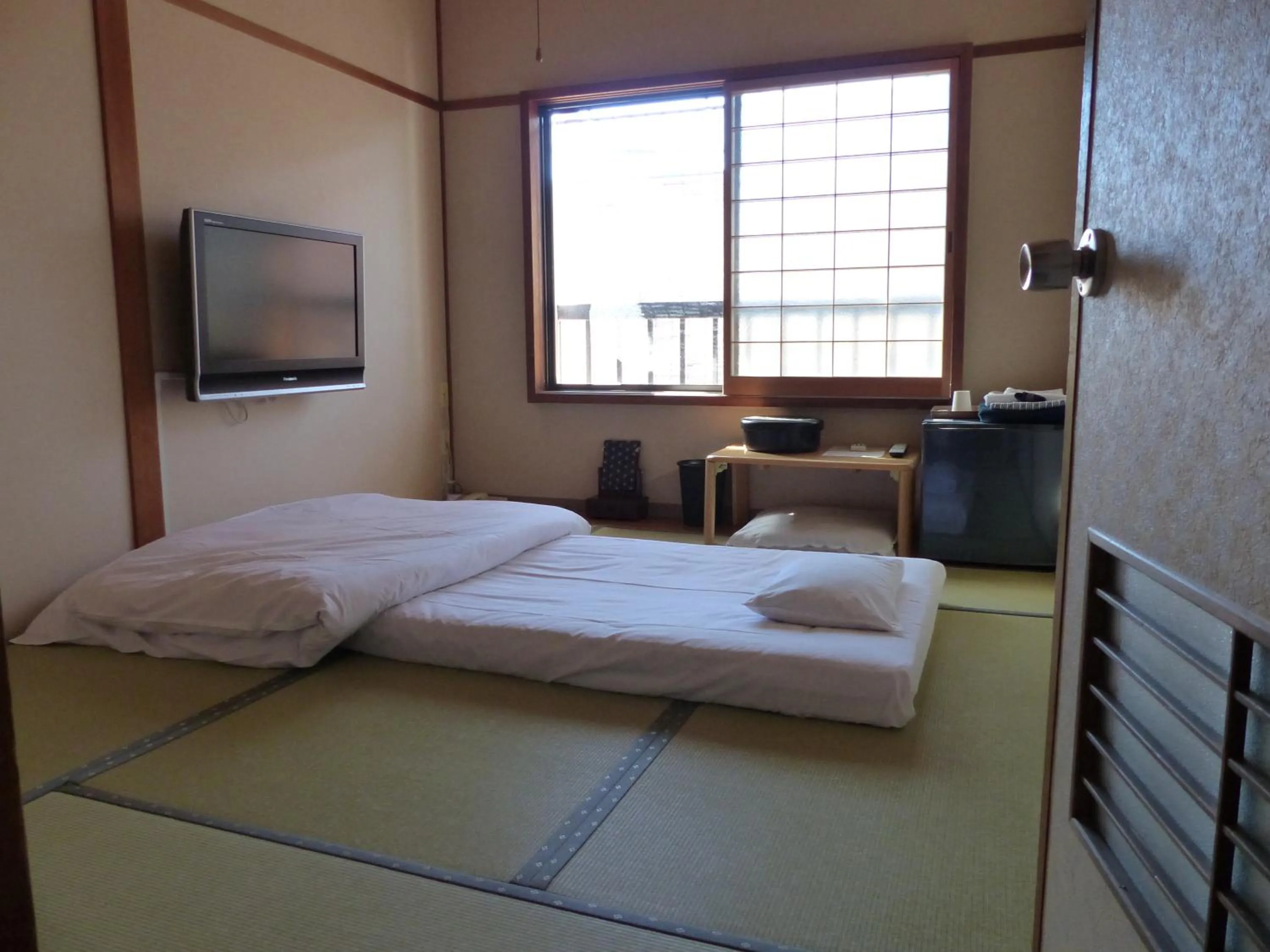 Bed in Minshuku Kuwataniya