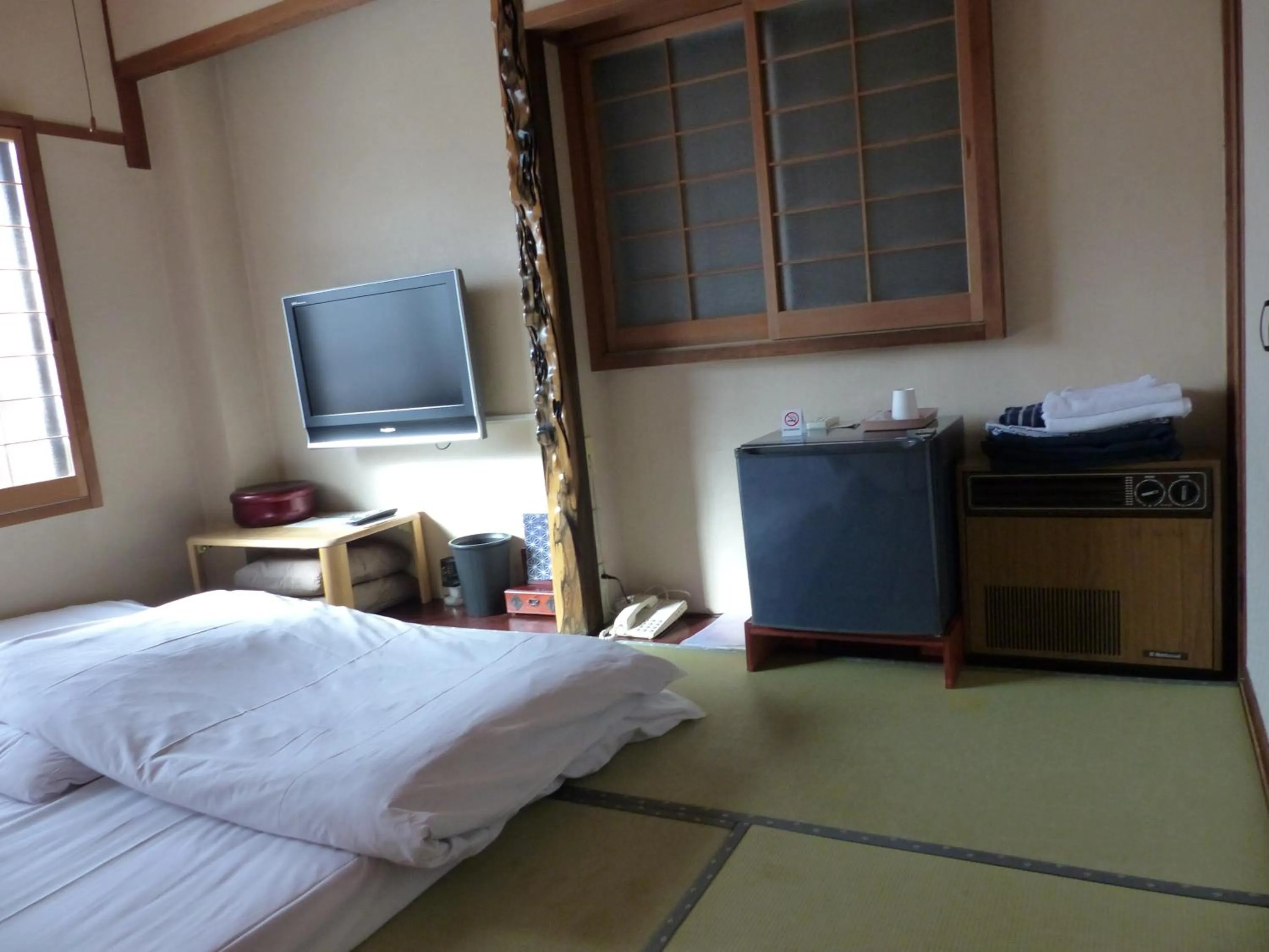 Bed in Minshuku Kuwataniya