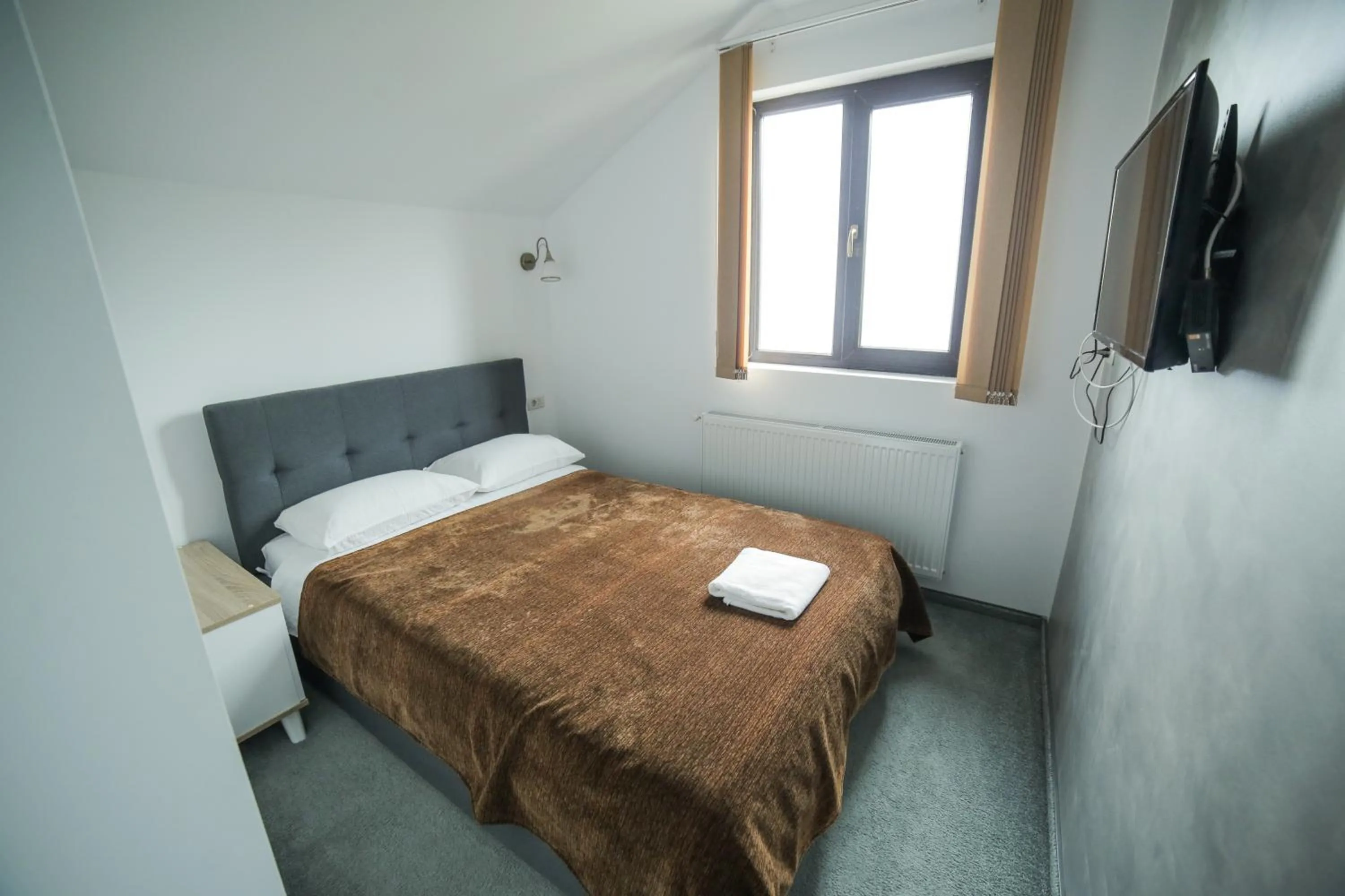 Bed in Hotel Muntele Mic