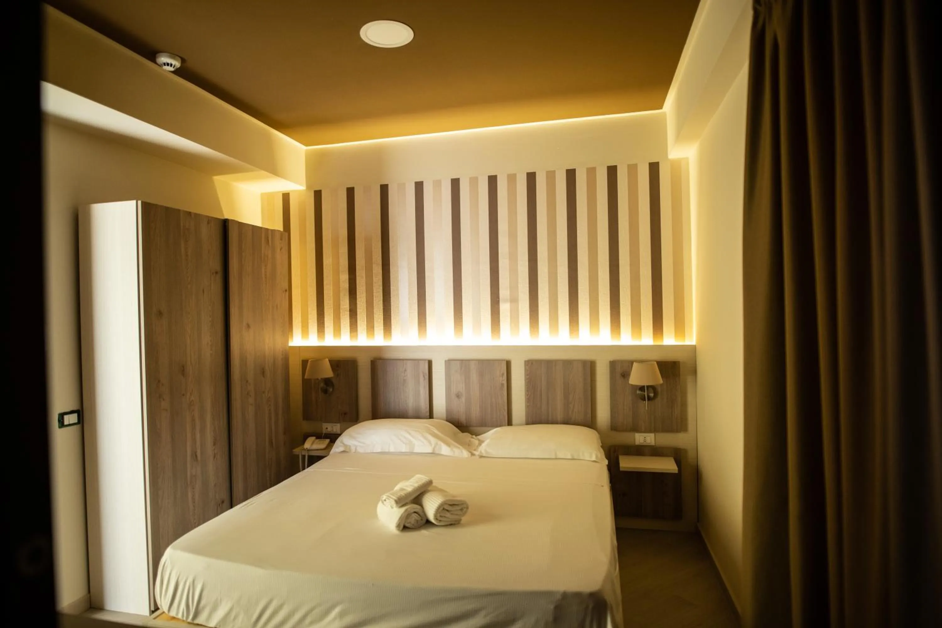 Bed in Hotel Cliché