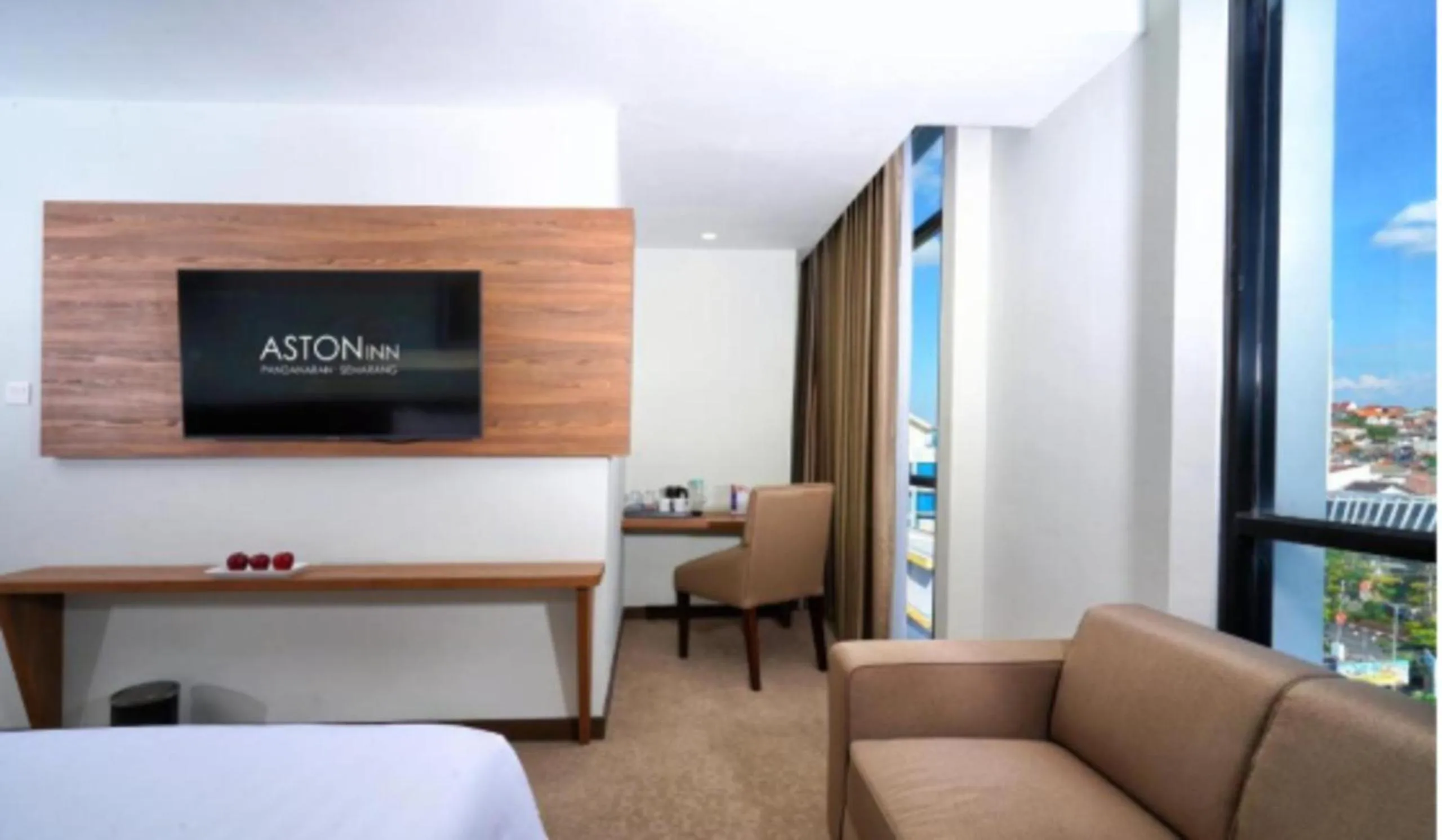 Seating area, Bed in Aston Inn Pandanaran