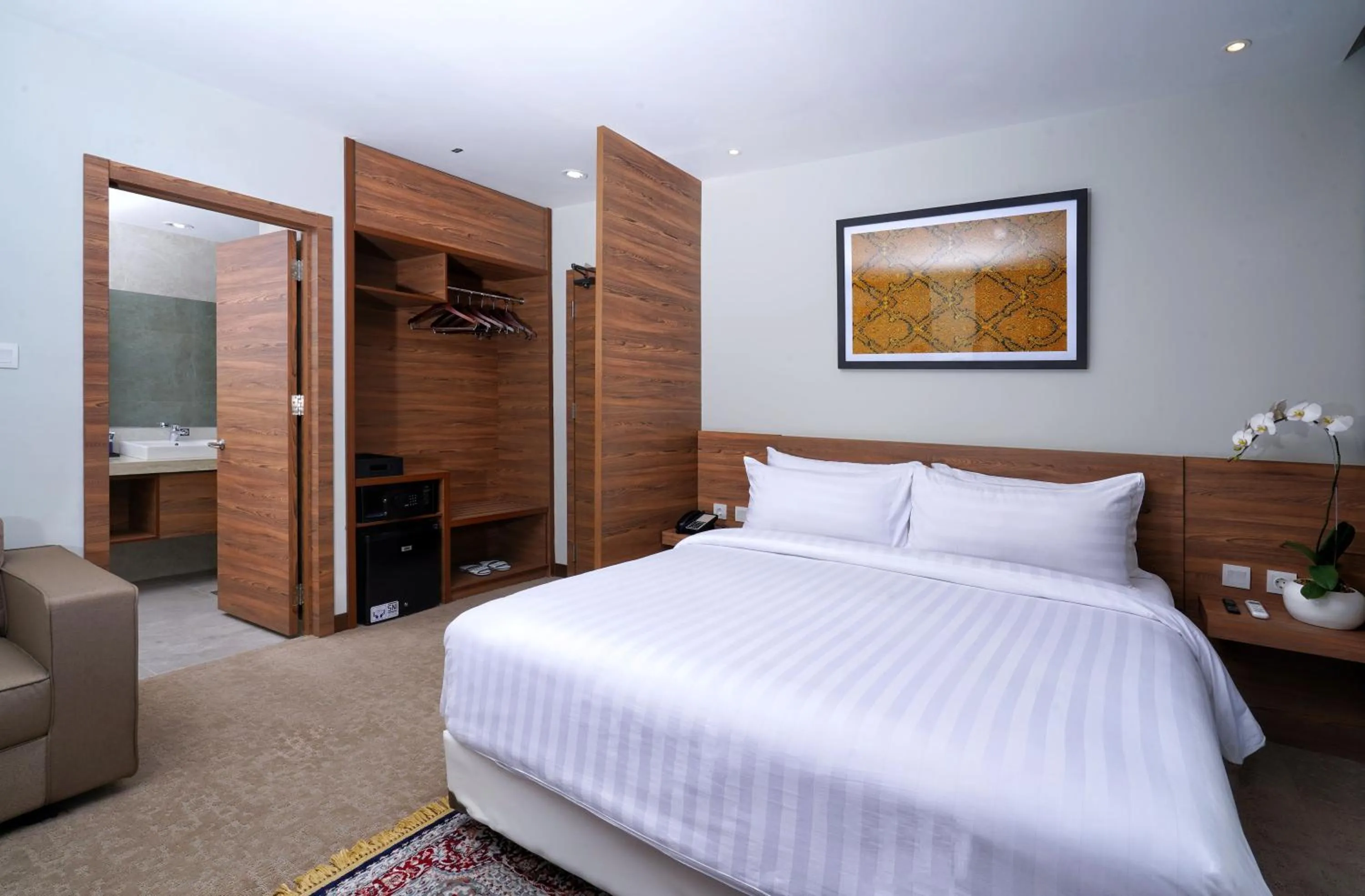 Bed in Aston Inn Pandanaran