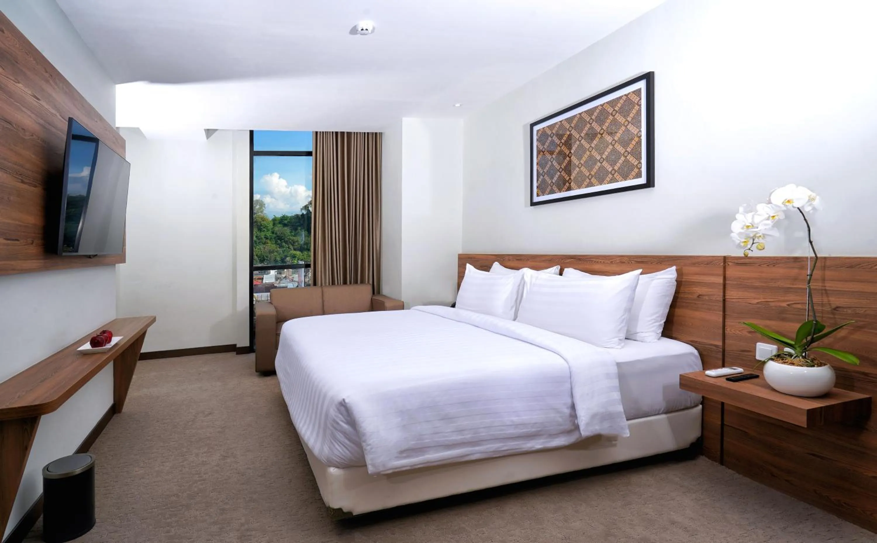 Bed in Aston Inn Pandanaran