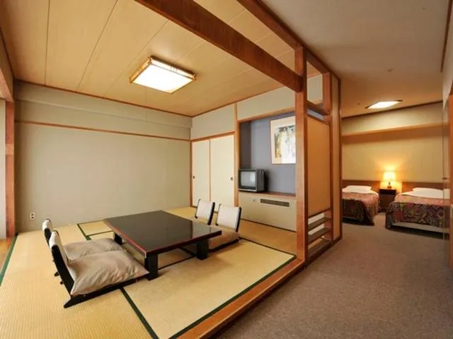 Bed in Itoen Hotel New Sakura
