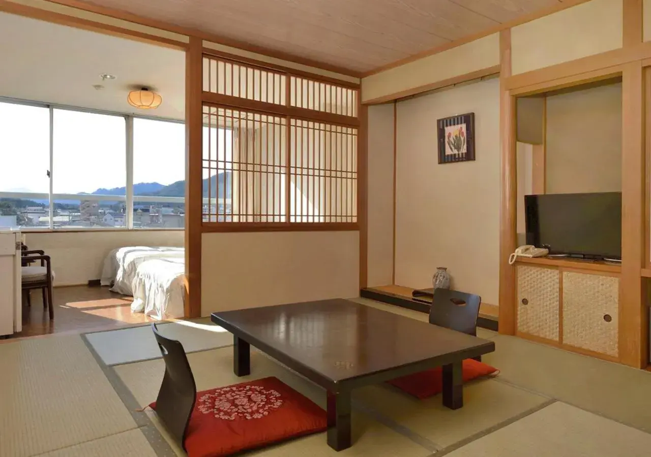 Twin Room with Tatami Area with Shared Bathroom - South Tower in Itoen Hotel New Sakura Twin Room with Tatami Area with Shared Bathroom - South Tower in Itoen Hotel New Sakura