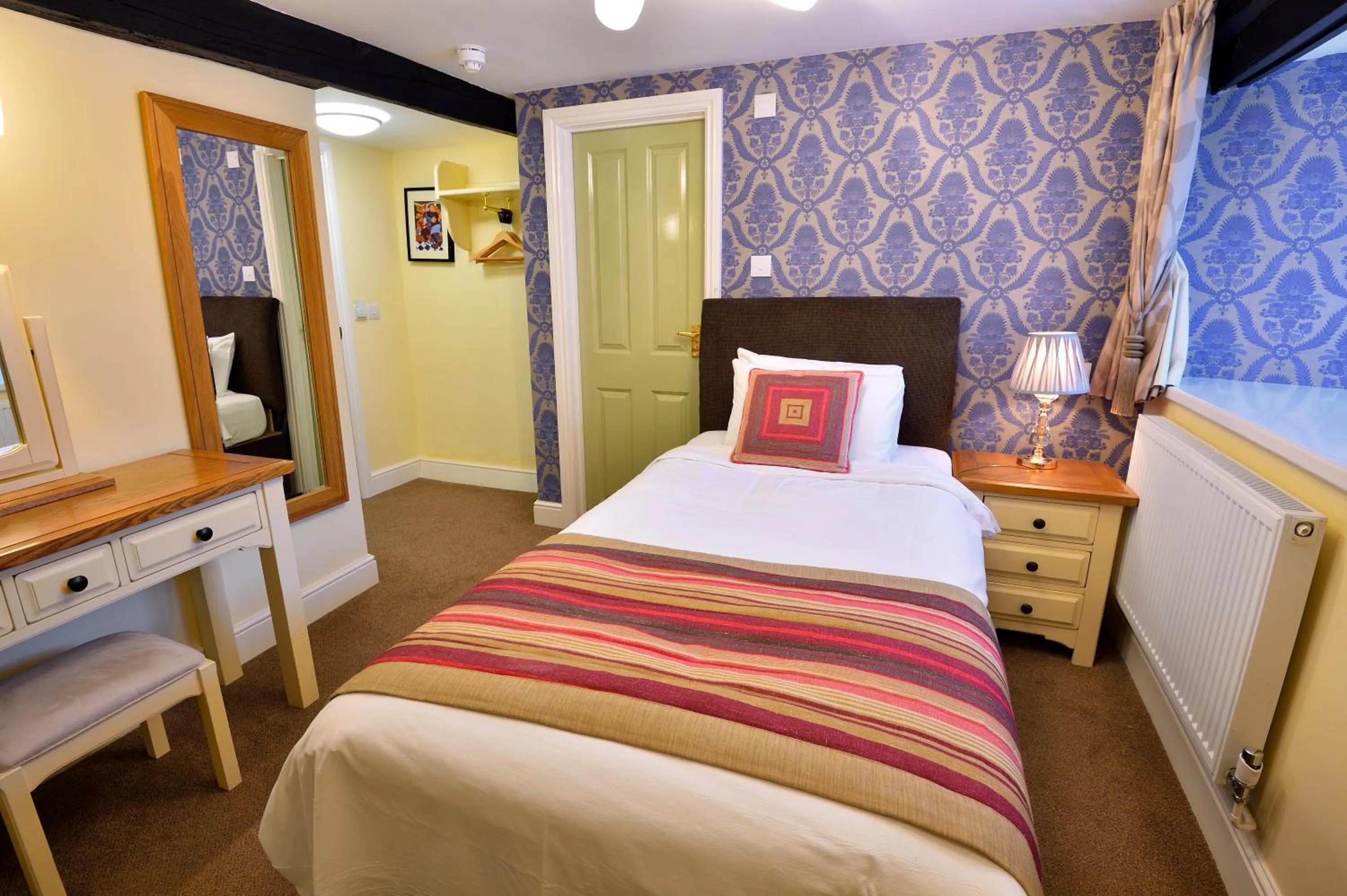 Bed in The Royal Victoria and Bull Hotel