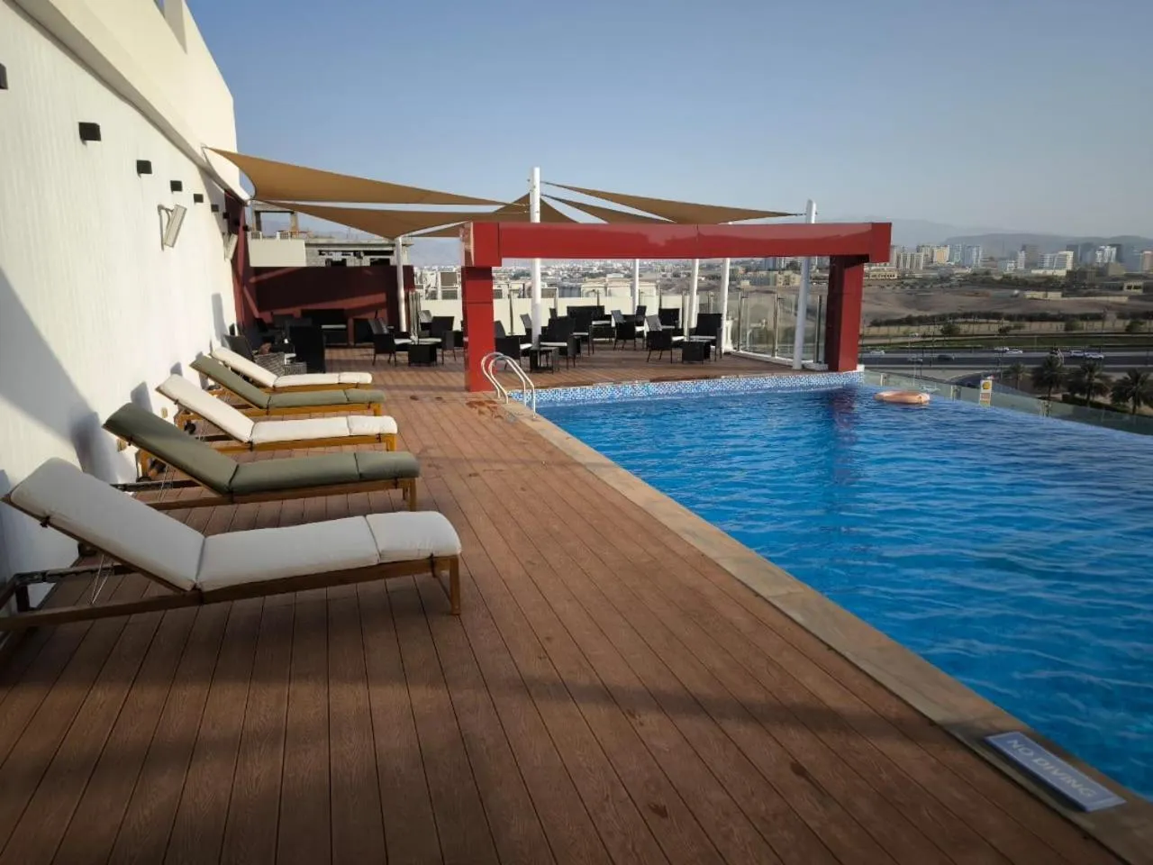 Swimming pool in Carnelian Muscat - Airport Hotel