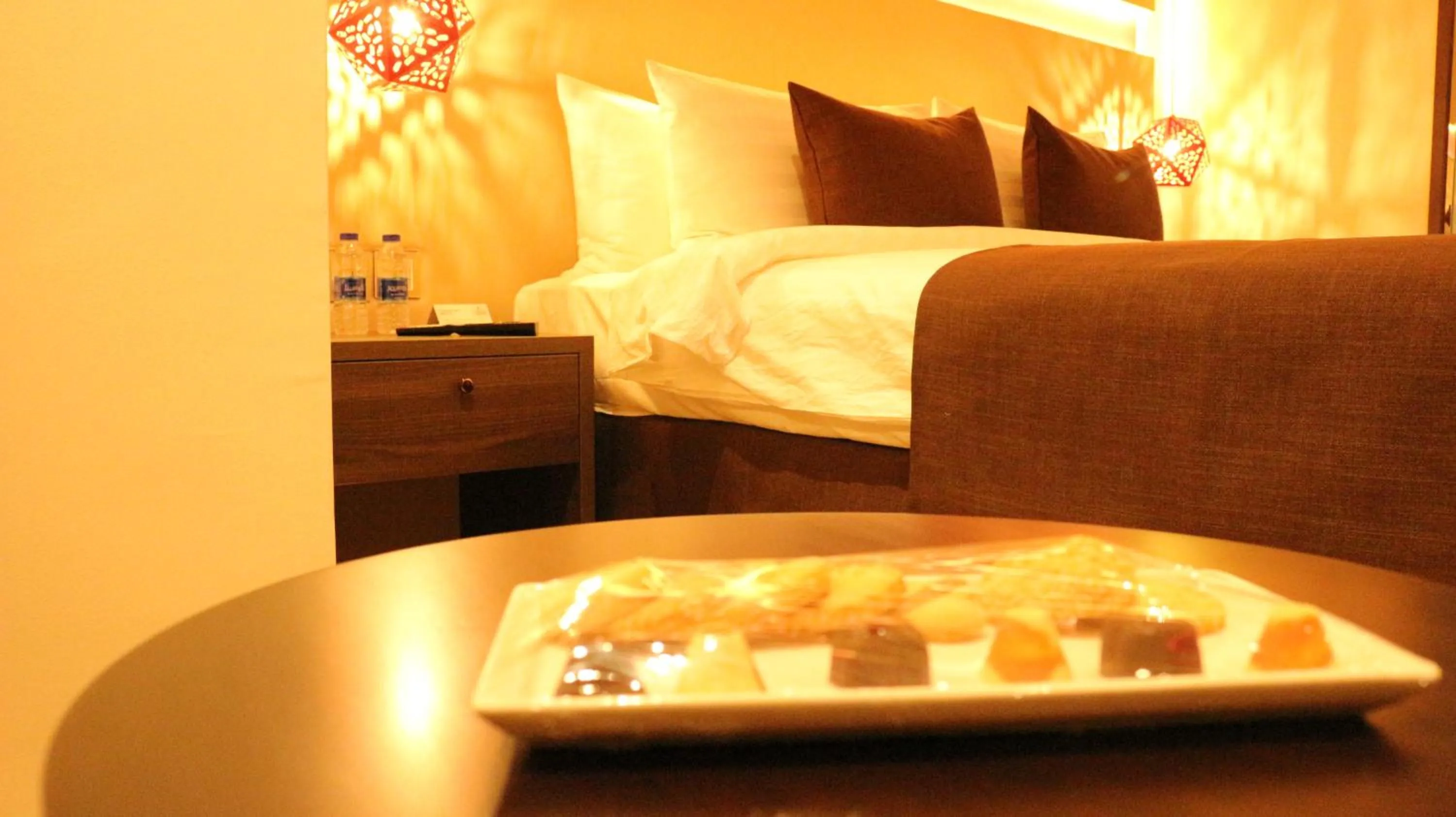 Bedroom, Bed in Carnelian Muscat - Airport Hotel