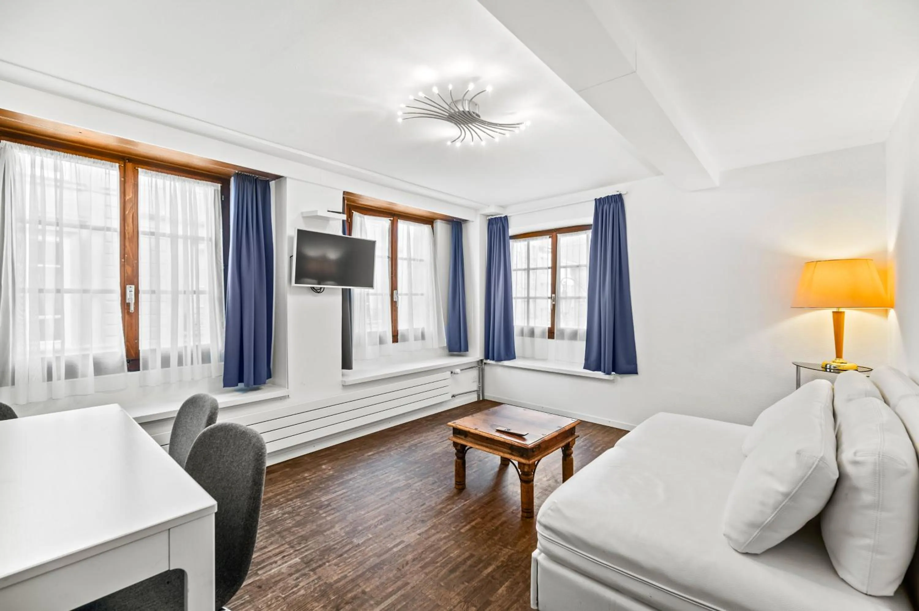 Living room, Bed in Aparthotel Hine Adon Fribourg