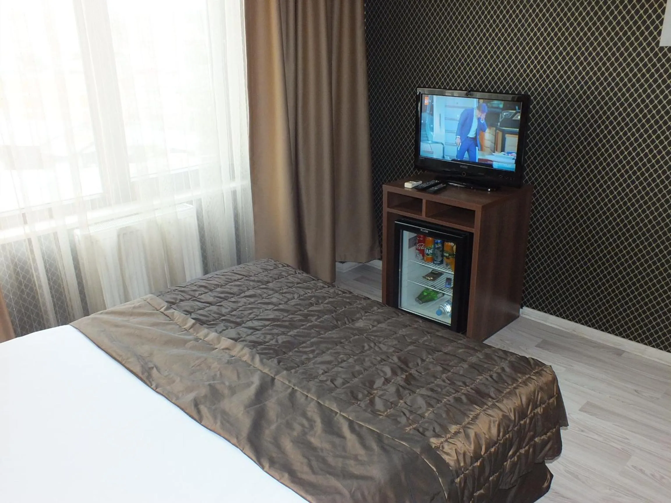 Bed in Lifos Hotel