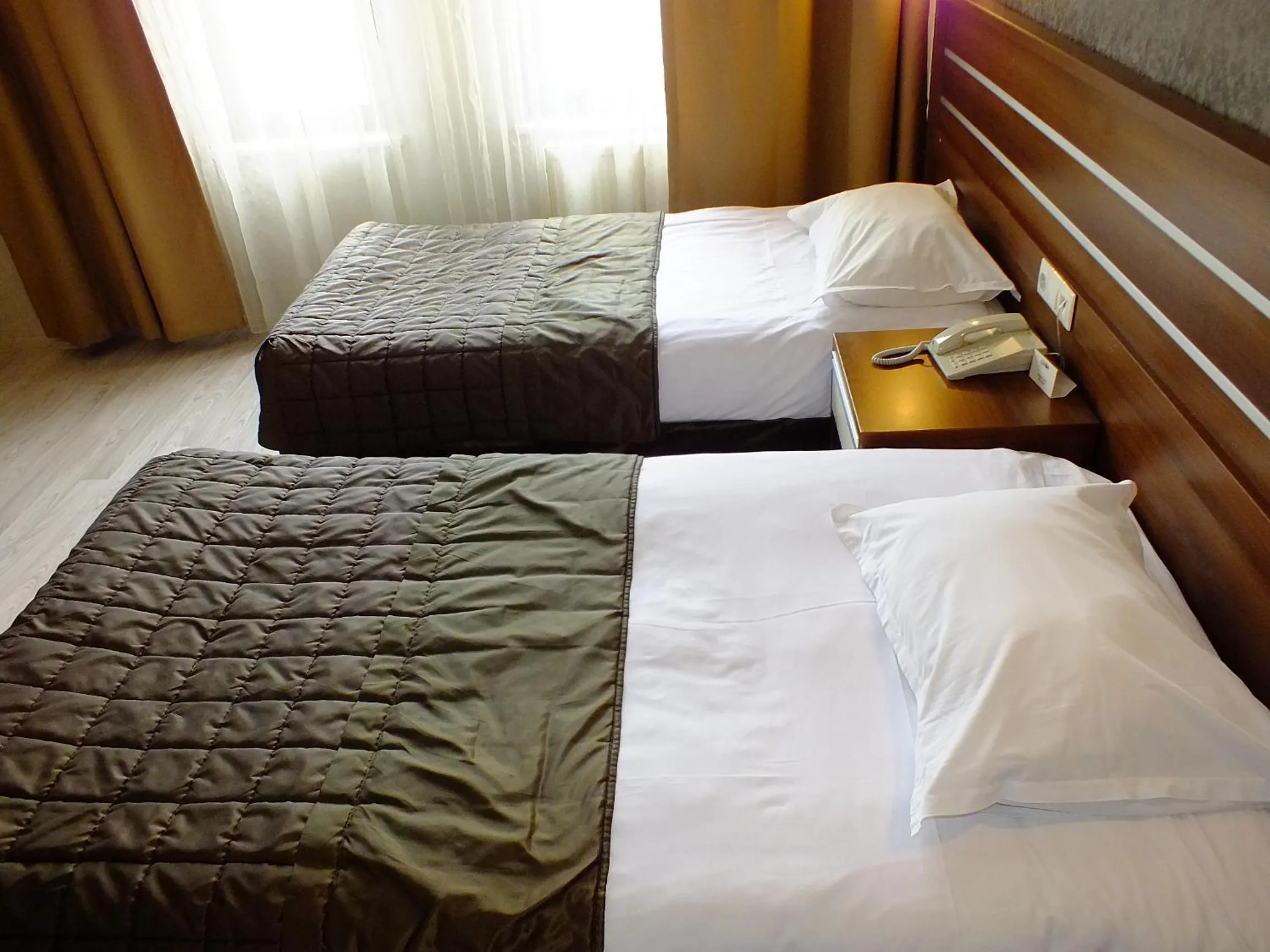 Bed in Lifos Hotel