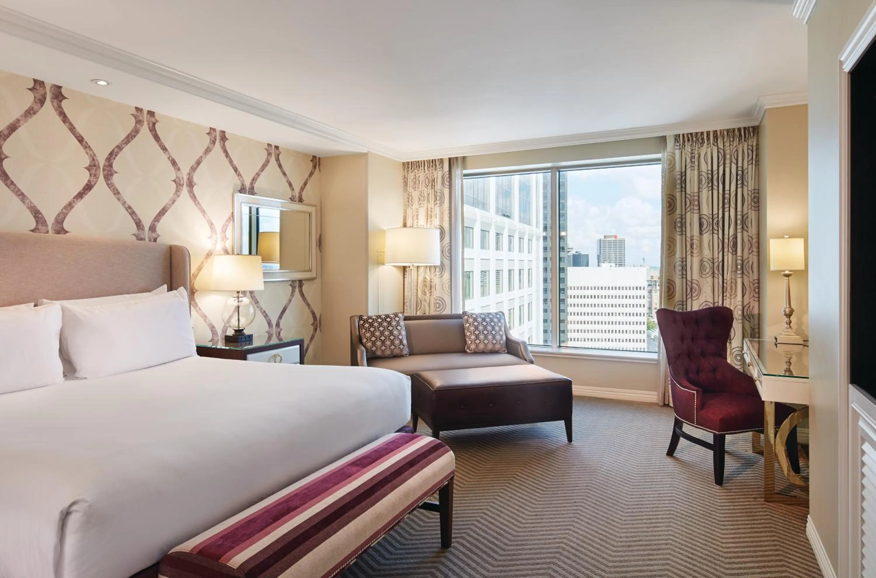 Seating area, Bed in Caesars New Orleans, A Caesars Destination
