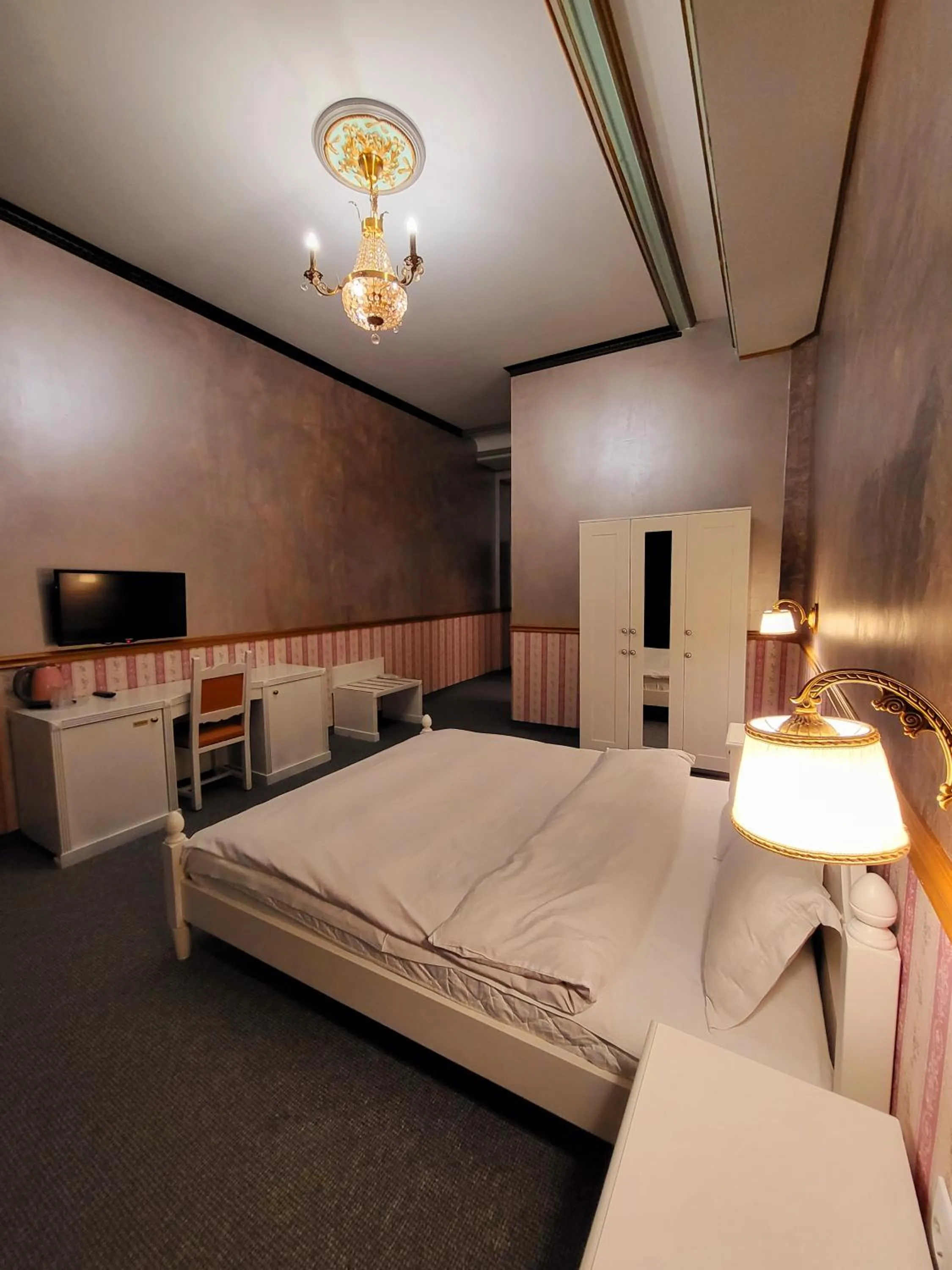 Bed in NF Palace Old City Bucharest